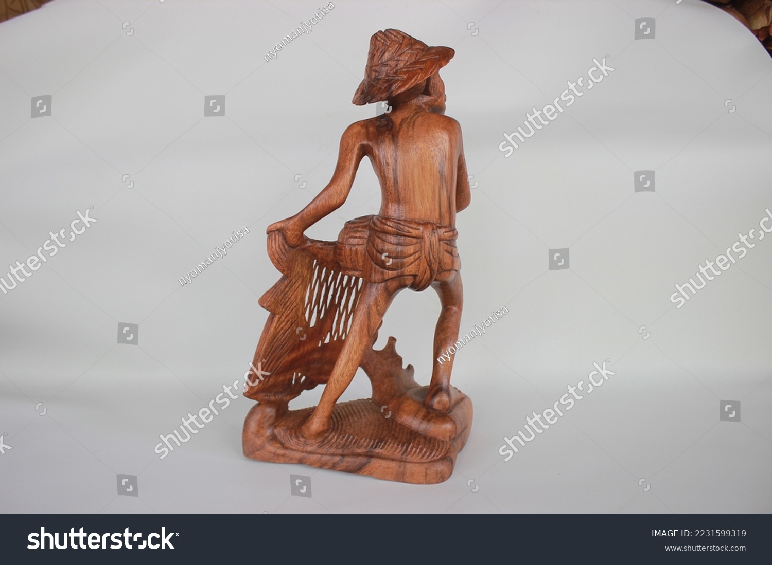 	
Balinese Wooden Fisherman Sculpture Wood Carving, Sculpture, Art from Bali Indonesia #2231599319