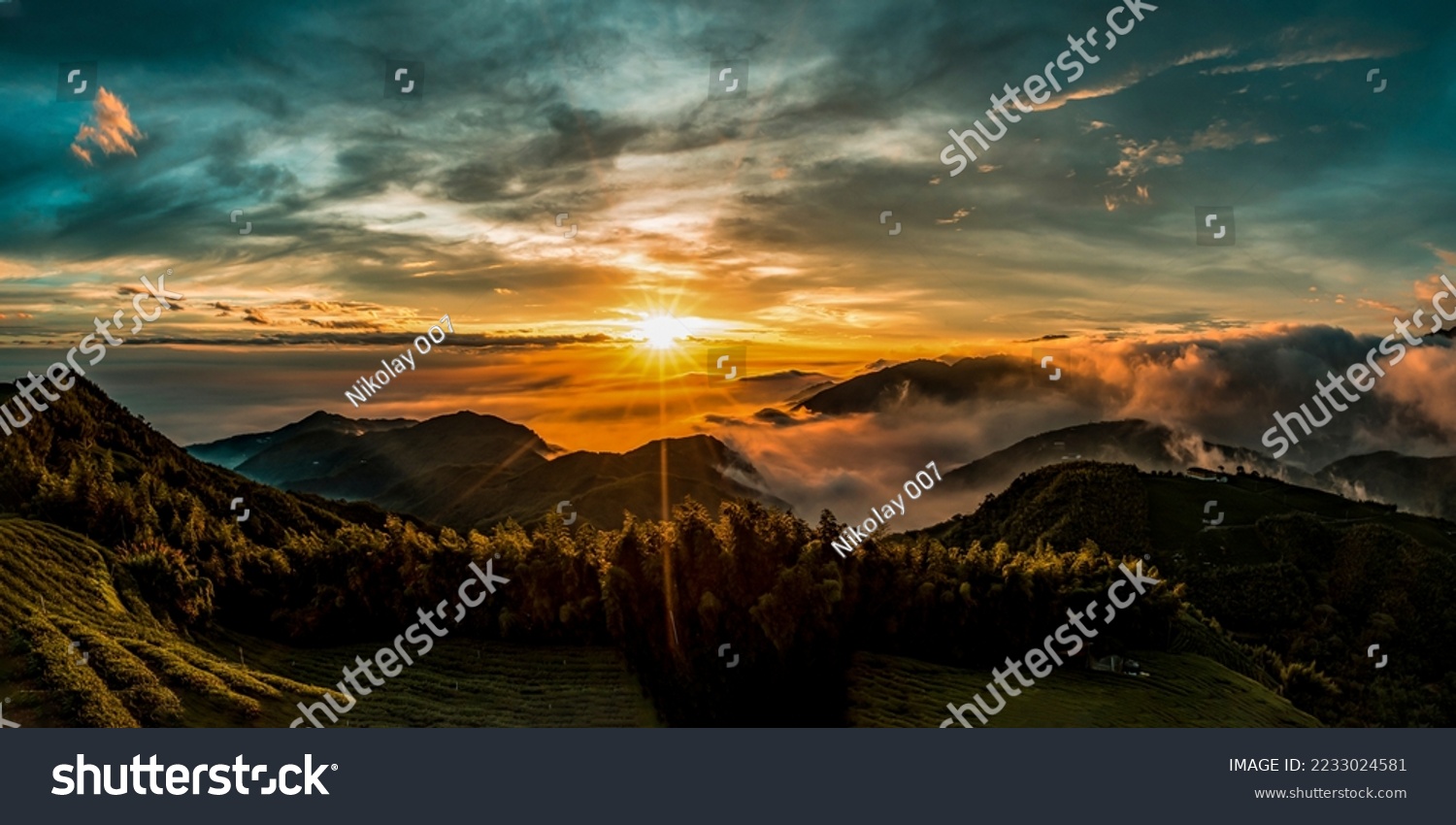 Panorama of the sunrise in the mountains. Sunrise fog in the morning in mountains. Mountain valley sunrise. Beautiful sunrise in foggy mountains #2233024581