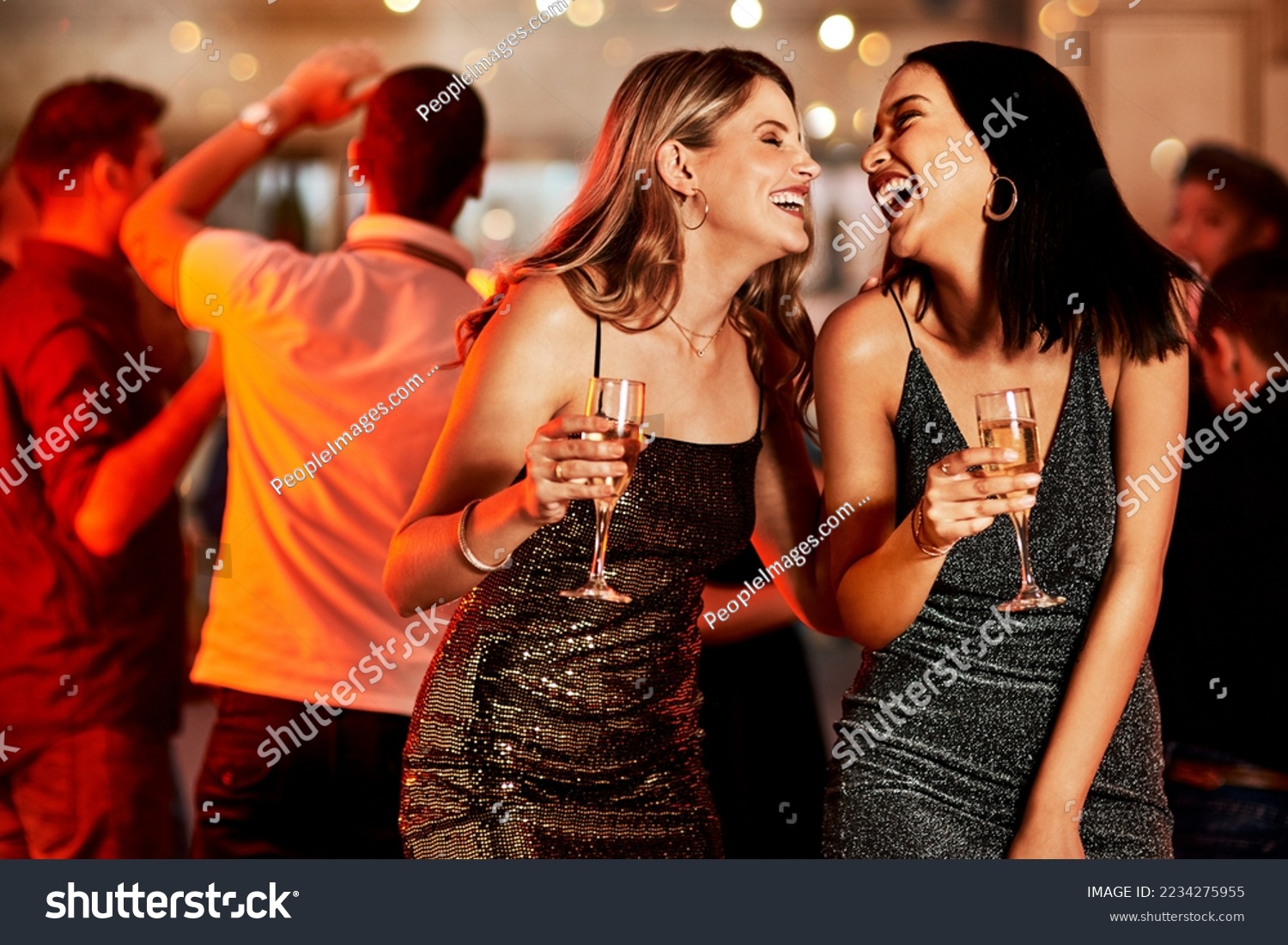 Women, laughing or bonding in champagne night party, clubbing event or birthday celebration in New York. Smile, happy people or friends with alcohol glasses on luxury restaurant or disco dance floor #2234275955