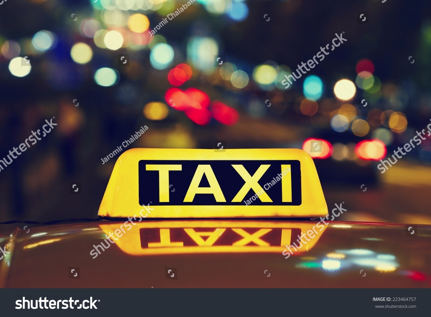 Taxi car on the street at night  #223464757