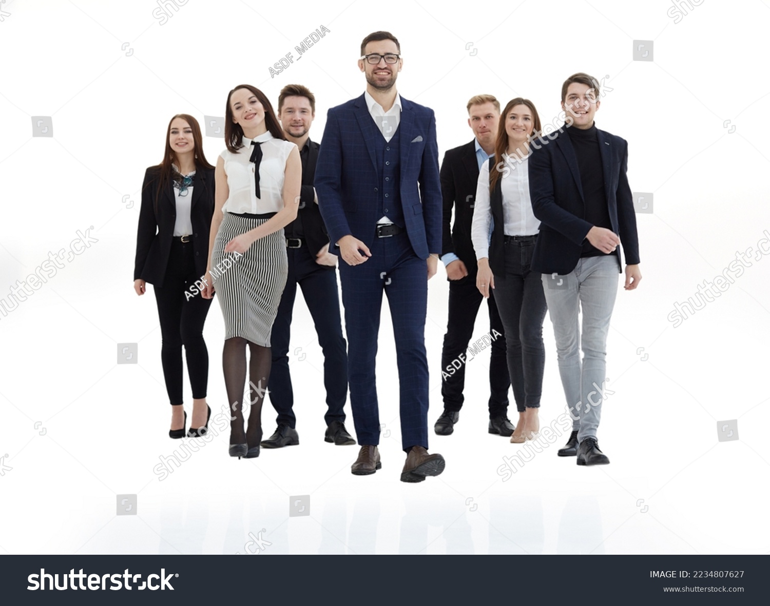 young business people walking behind their leader #2234807627