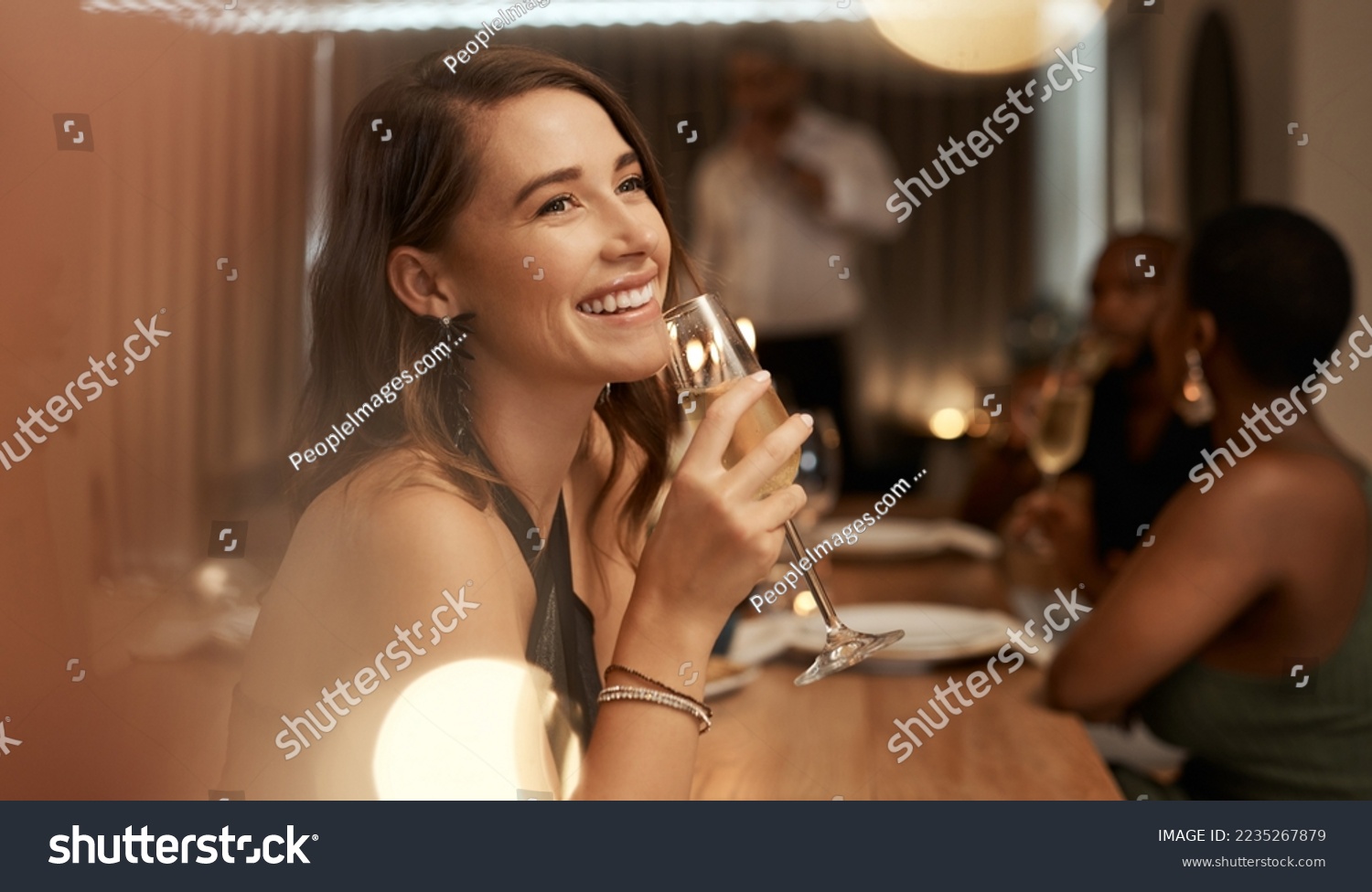 Happy, dinner party and woman with glass of champagne for special celebration event, friendship reunion or New Year. Fine dining restaurant, friends and elegant girl with alcohol drink to celebrate #2235267879
