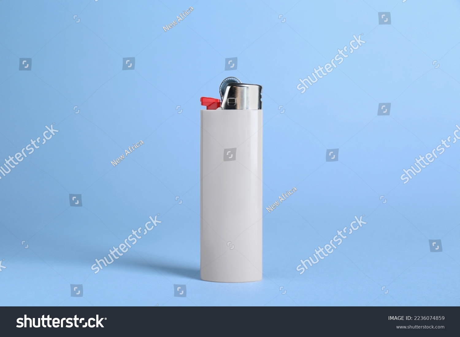 Stylish small pocket lighter on white background #2236074859