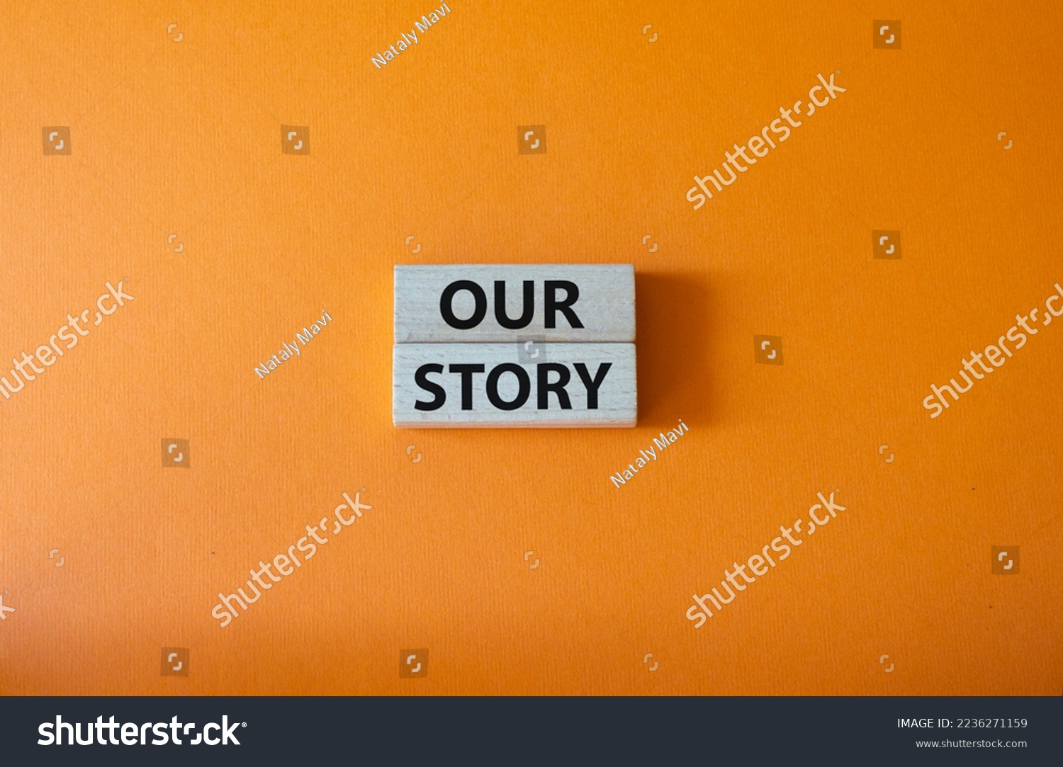 Our story symbol. Wooden blocks with words Our story Beautiful orange background. Business and Our story concept. Copy space. #2236271159