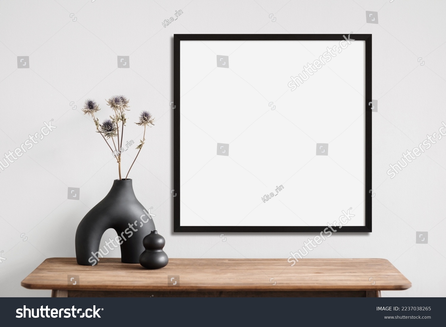 Blank picture frame mockup on a wall. Square orientation. Artwork template in interior design #2237038265