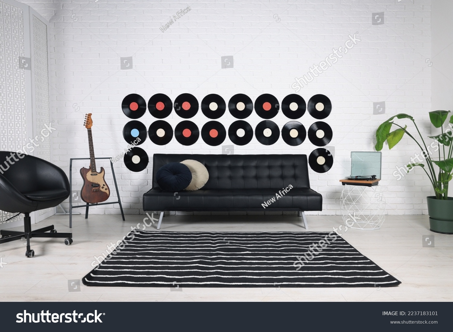 Living room decorated with vinyl records. Interior design #2237183101