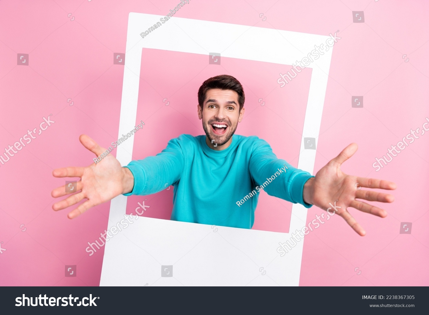 Photo portrait of attractive young man polaroid instant photo frame ready hug dressed stylish blue outfit isolated on pink color background #2238367305
