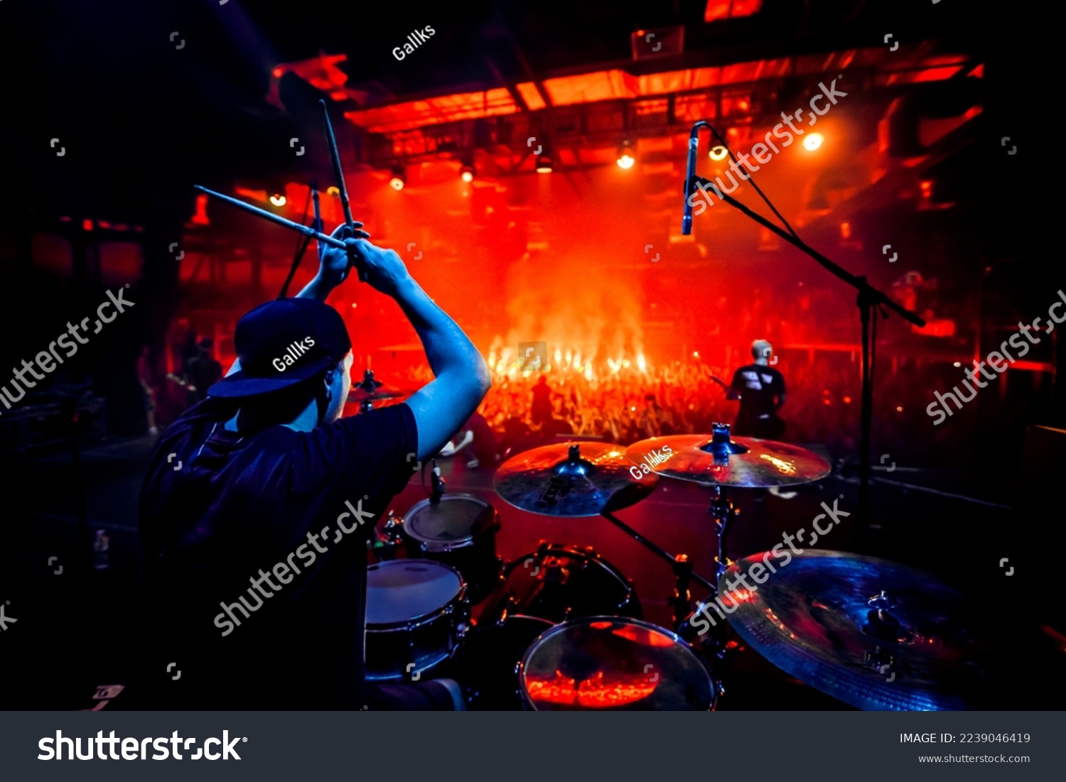 Rock concert poster. A drummer plays drums during a show. Band on a stage club.
 #2239046419