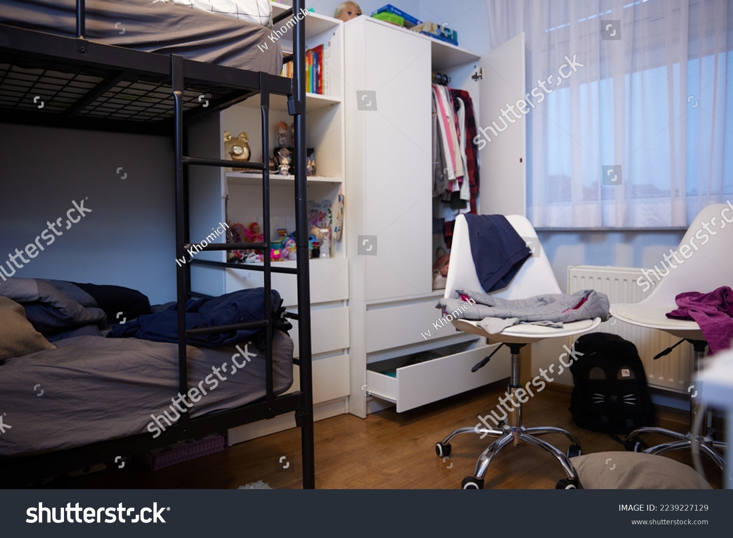 mess, disorder and interior concept - view of messy home kid's room with scattered stuff #2239227129