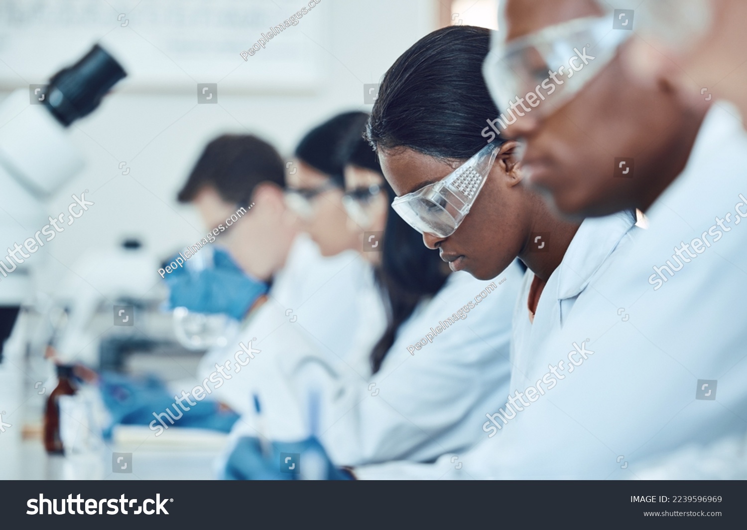 Study, research and scientist team in a lab for medical, innovation and drug analysis, health and medicine. Science, healthcare and doctors in room for clinical, drug and trial planning in laboratory #2239596969