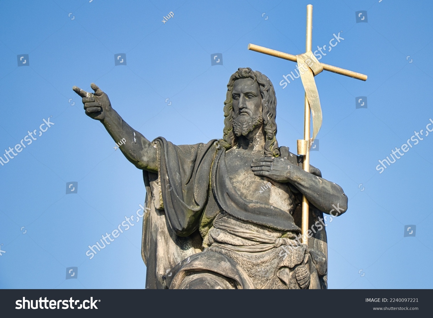 Statue of St. John the Baptist on Charles bridge, Prague. Czech Republic. #2240097221