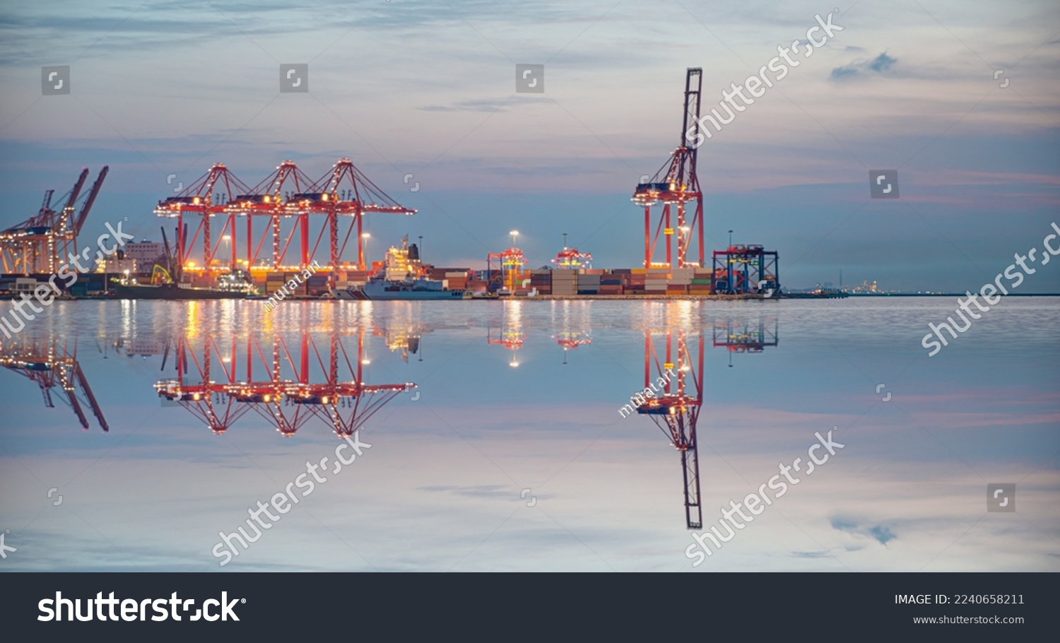Container terminal in industrial port with cranes - Ship loading in port with busy port at night - Mersin, Turkey #2240658211
