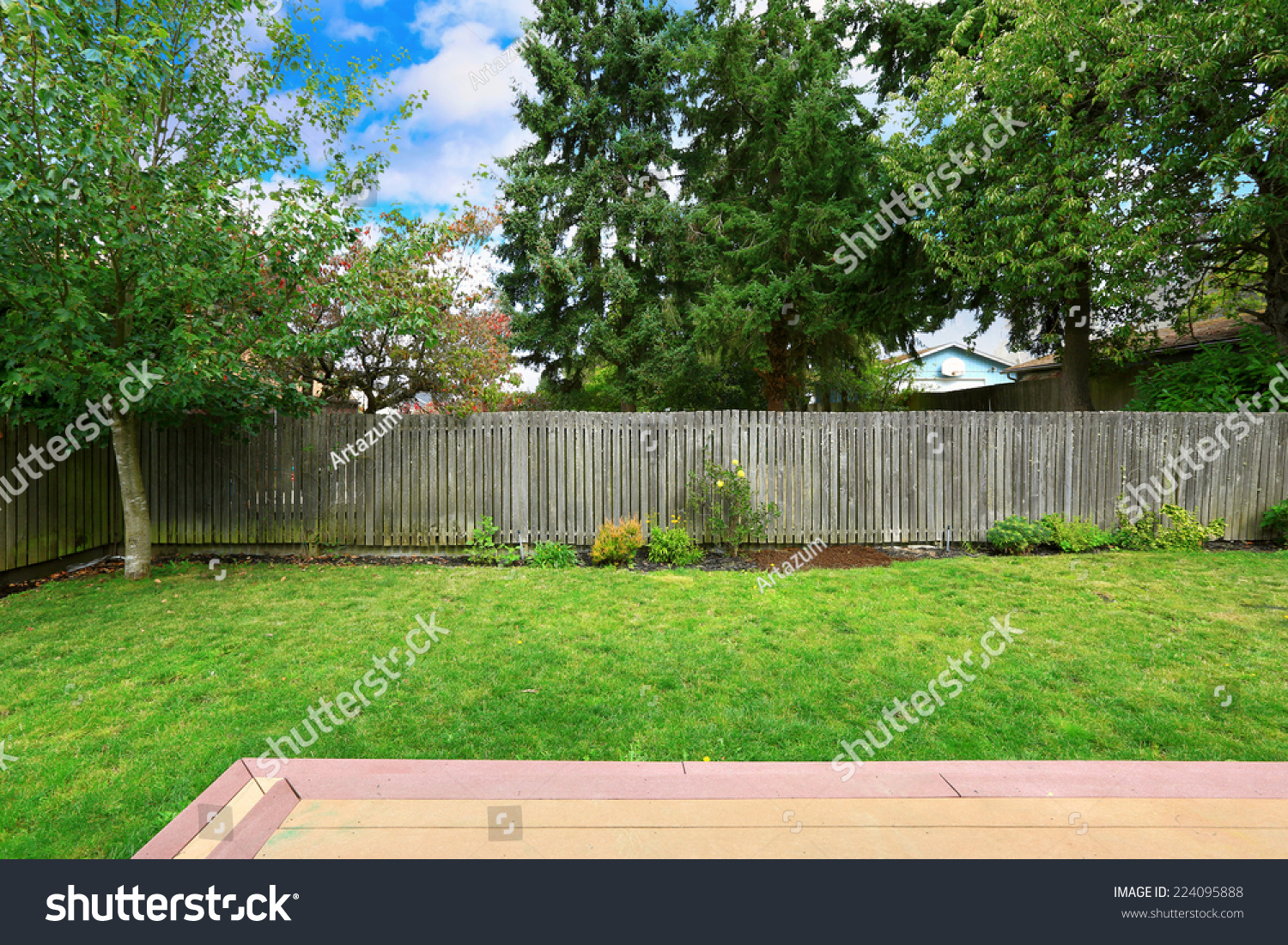 Countryside house backyard with old wooden fence. #224095888