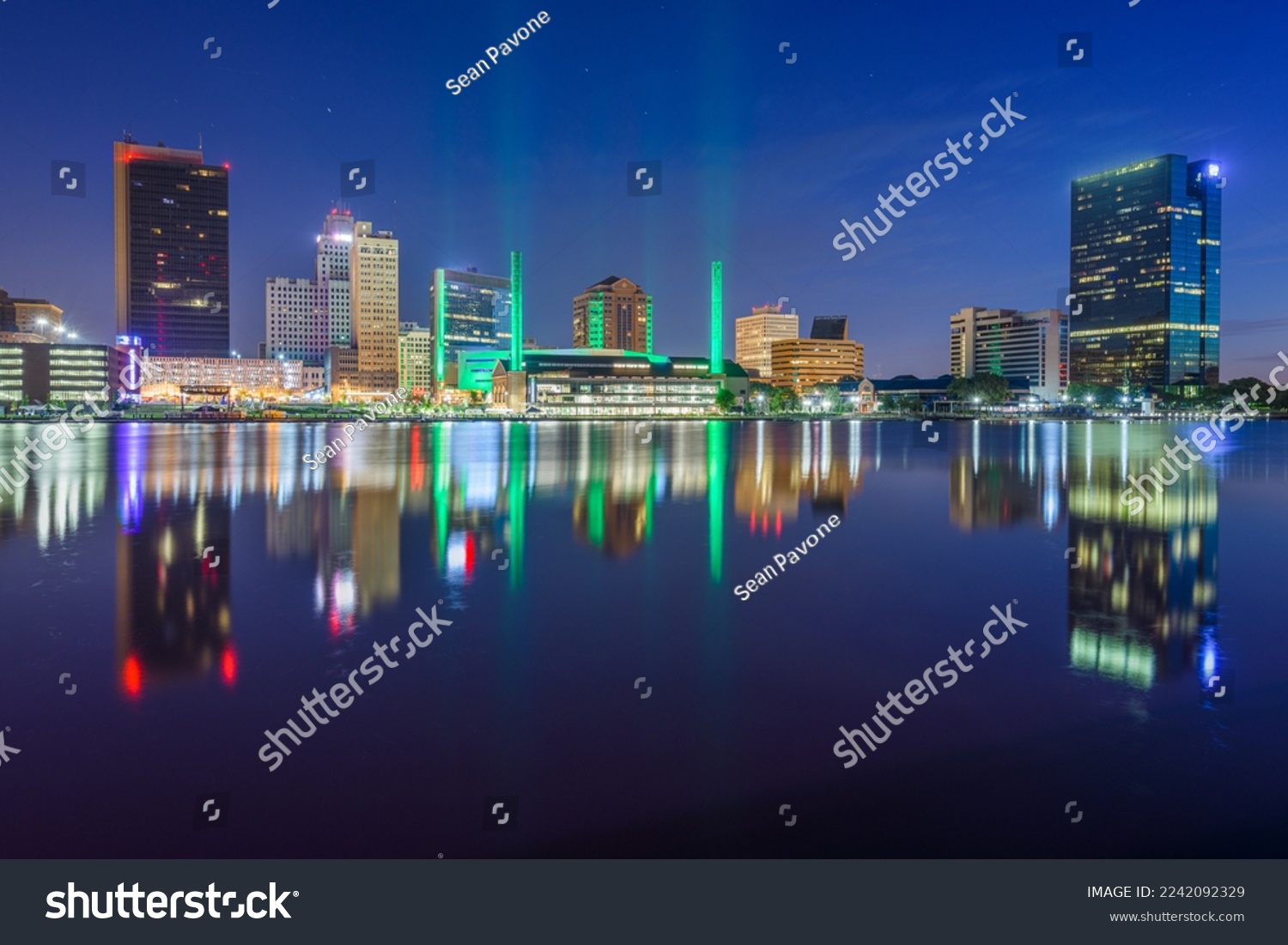 Toledo, Ohio, USA downtown skyline on the Maumee River at twilight. #2242092329