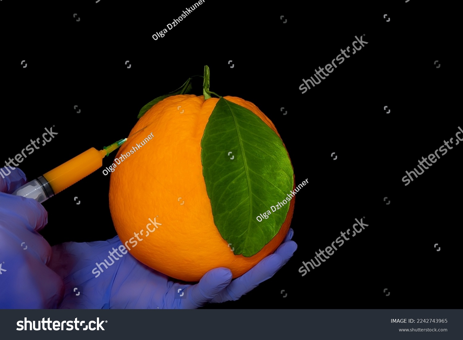 Orange with inserted syringe . Grapefruit symbolizes the fear of injections. Fruit contamination with chemicals. Genetic modification of food #2242743965