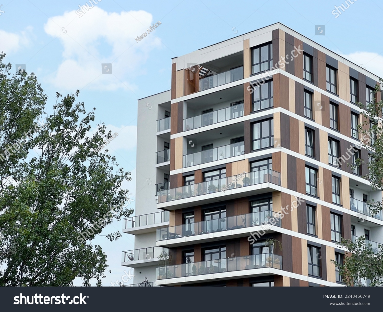 Exterior of beautiful building with balconies outdoors #2243456749