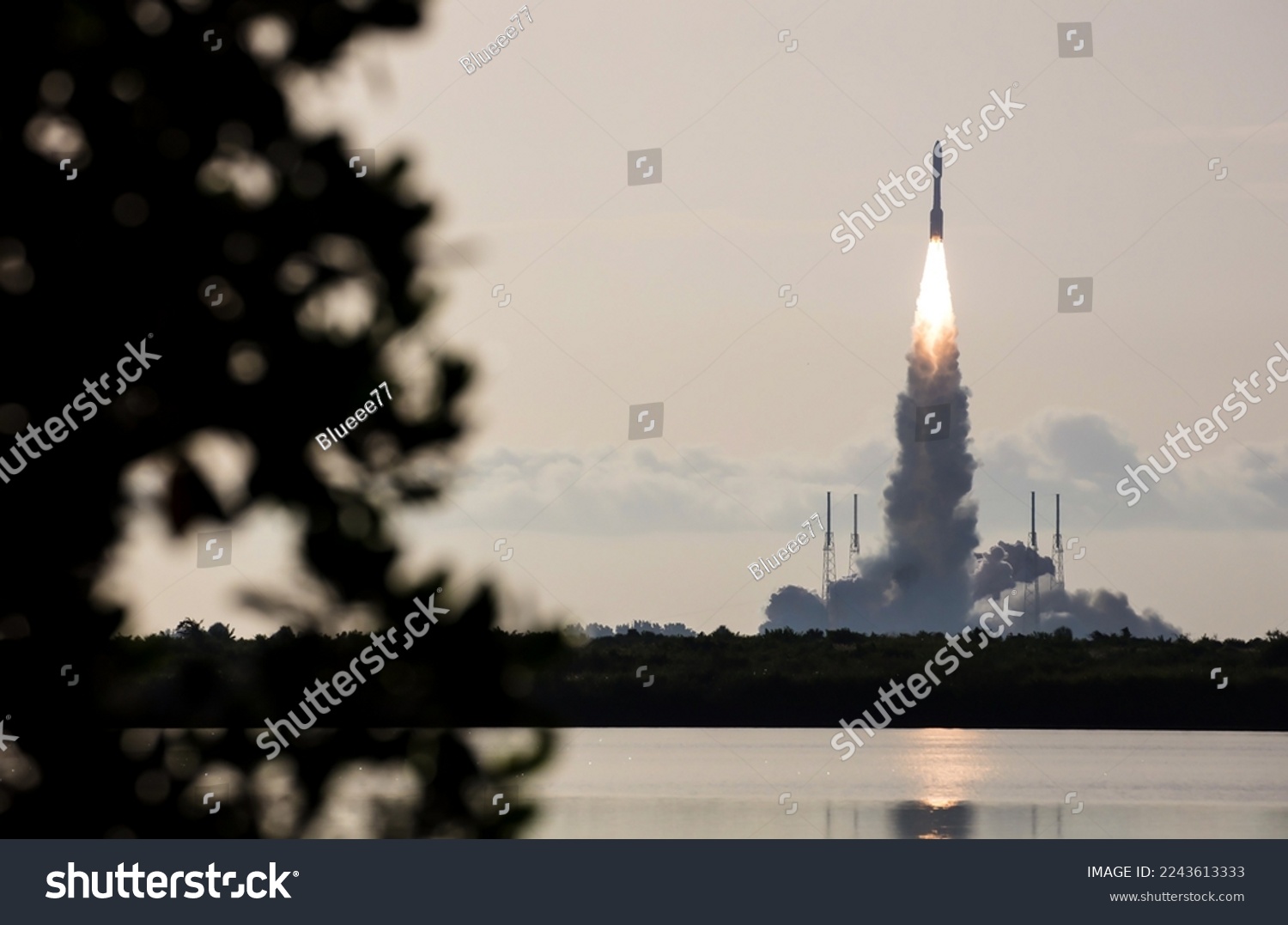 Rocket launching from rocket stage at Cape Canaveral, FL. Digitally enhanced. Elements of this image furnished by NASA. #2243613333