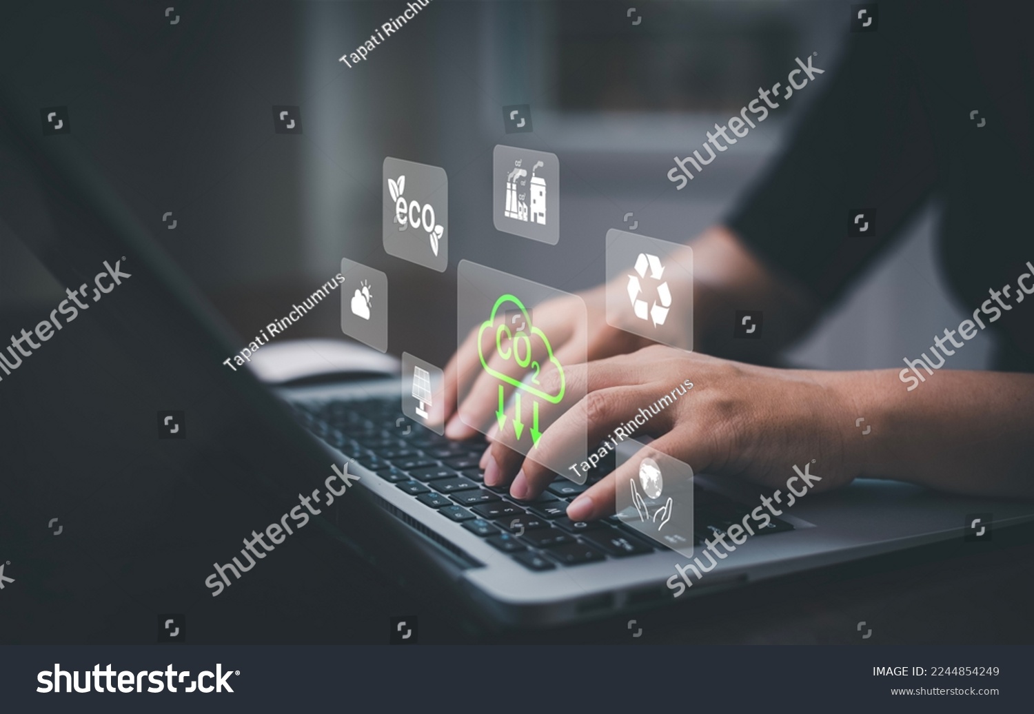 Businessman using laptops and touch recycle symbol with virtual modern reduce CO2 emission concept with icons, global warming emissions carbon footprint climate change to limit global warming, energy #2244854249
