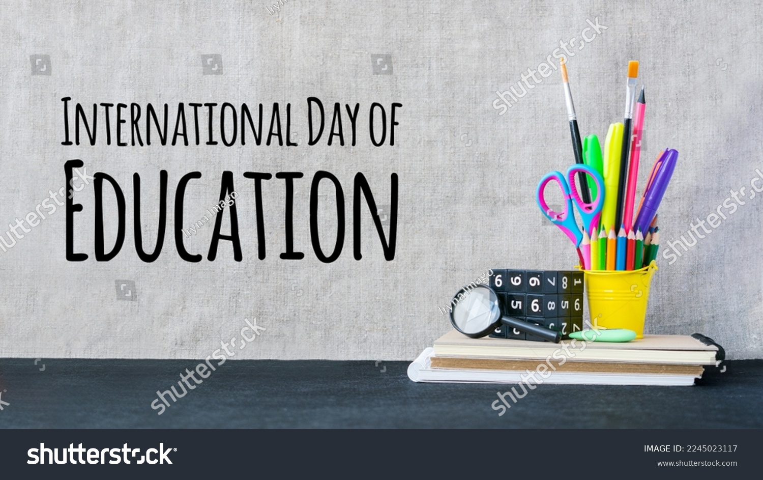 International Day of Education concept with color school supplies on desk. International Education Day, 24 January greeting card. #2245023117