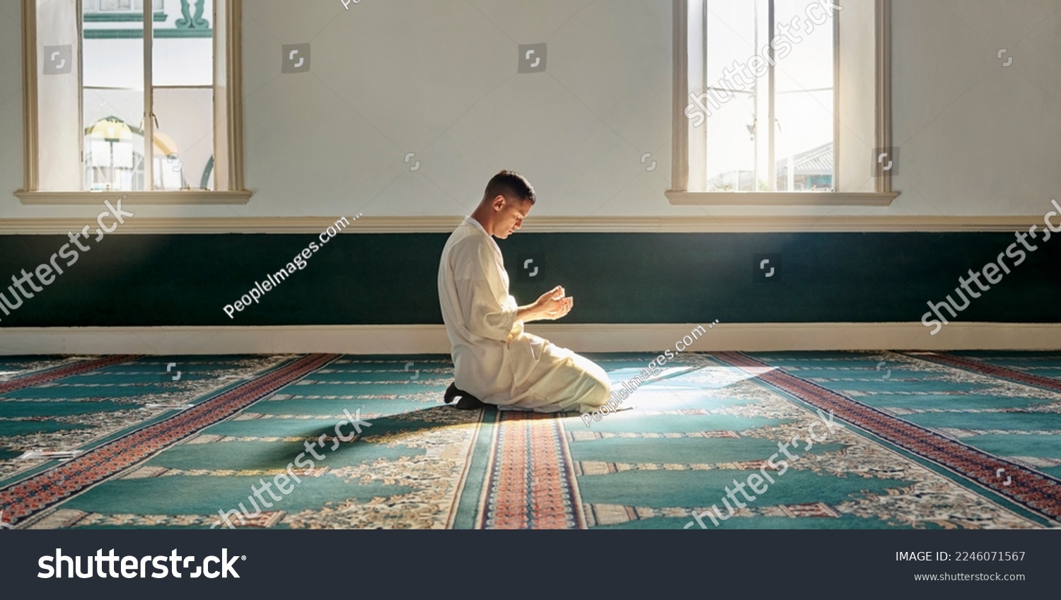 Muslim pray, hope or hands in prayer on carpet for peace, gratitude or support to Allah in holy temple or mosque. Trust, Islamic or spiritual person praying to worship God on Ramadan Kareem in Qatar #2246071567