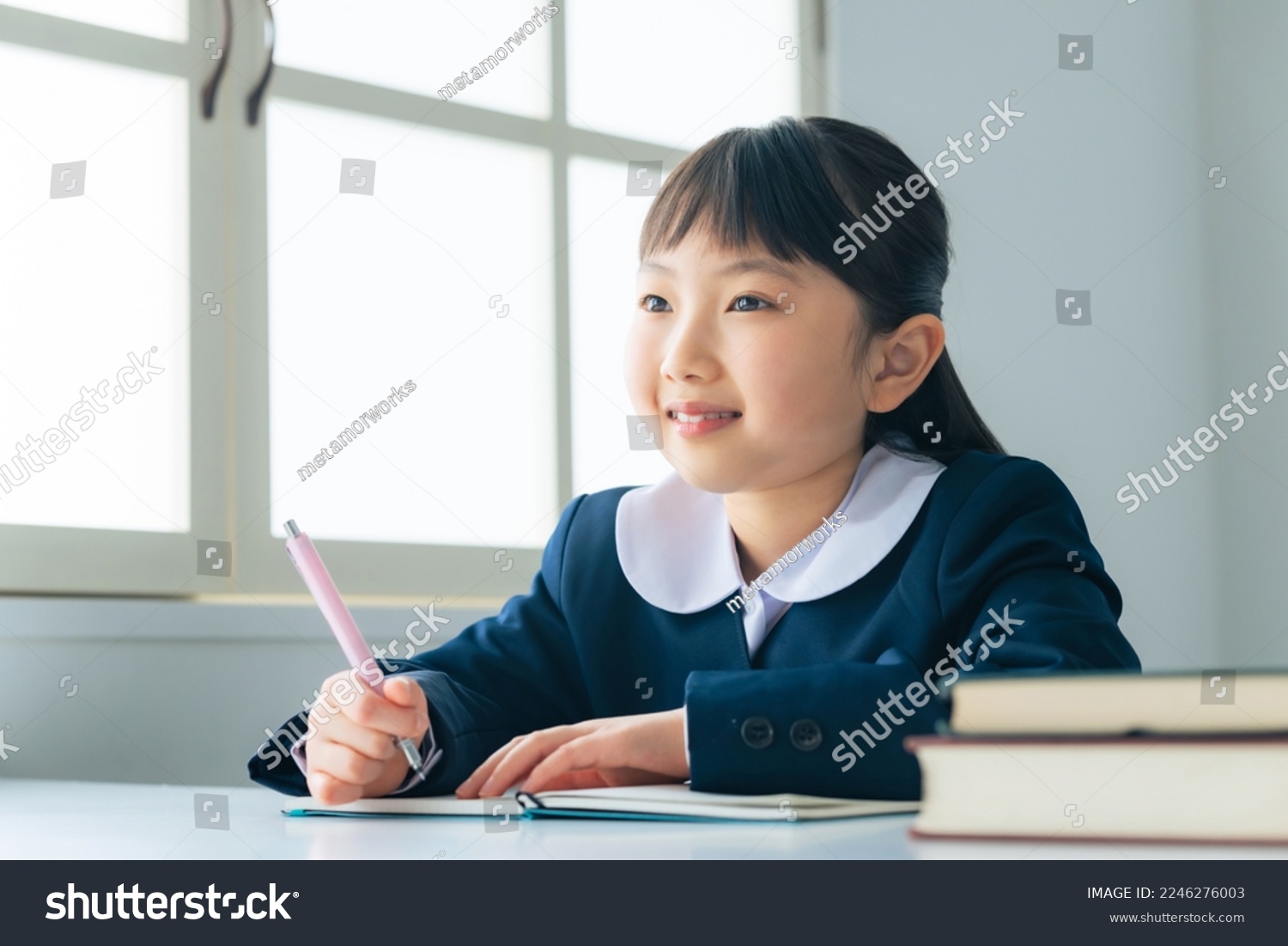 Asian elementary school student studying in the classroom. #2246276003