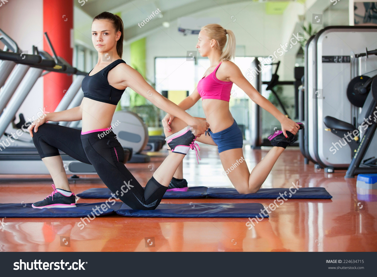 beautiful young women working out in the fitness studio #224634715