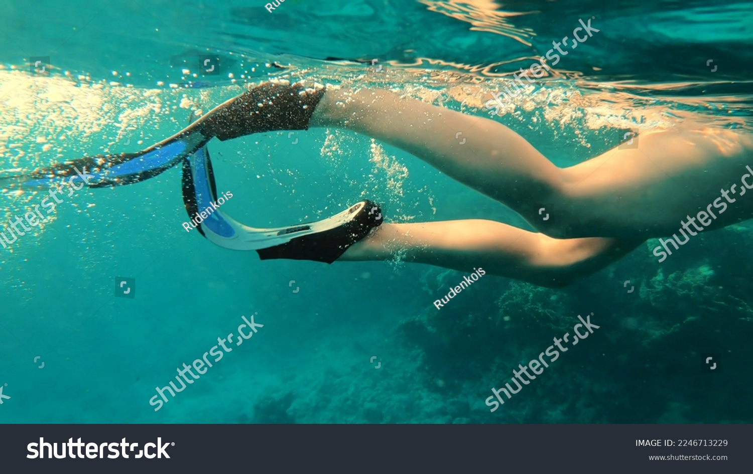 Girl swims in fins. Woman legs #2246713229