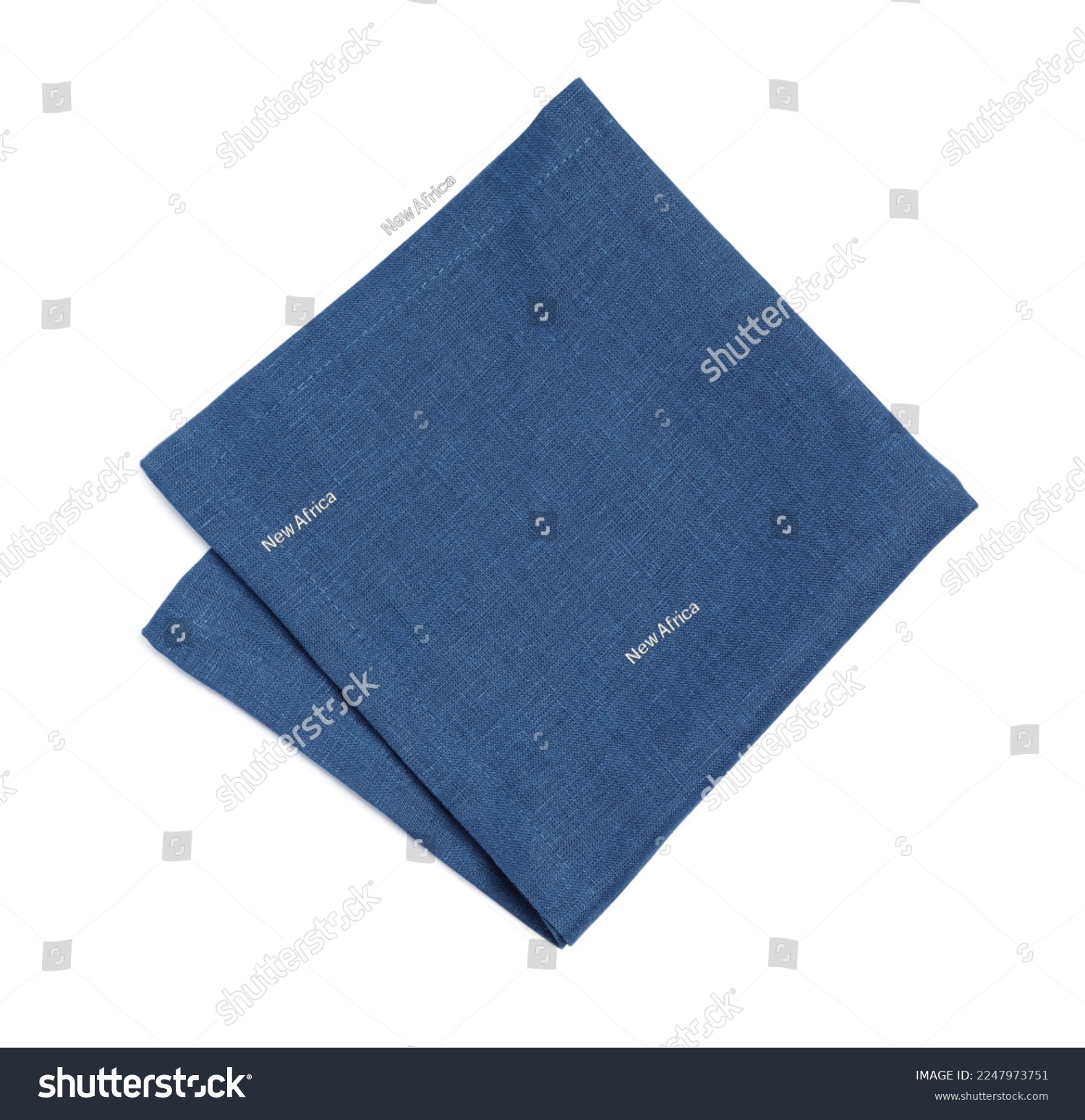 Blue folded fabric napkin on white background, top view #2247973751