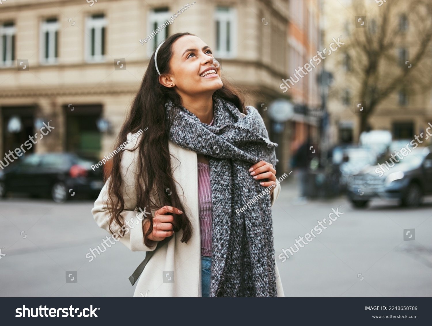 Walking, city buildings and happy woman on outdoor travel adventure in sidewalk street, road or journey In Chicago Illinois. Urban architecture, beauty and girl smile on winter vacation tour in USA #2248658789