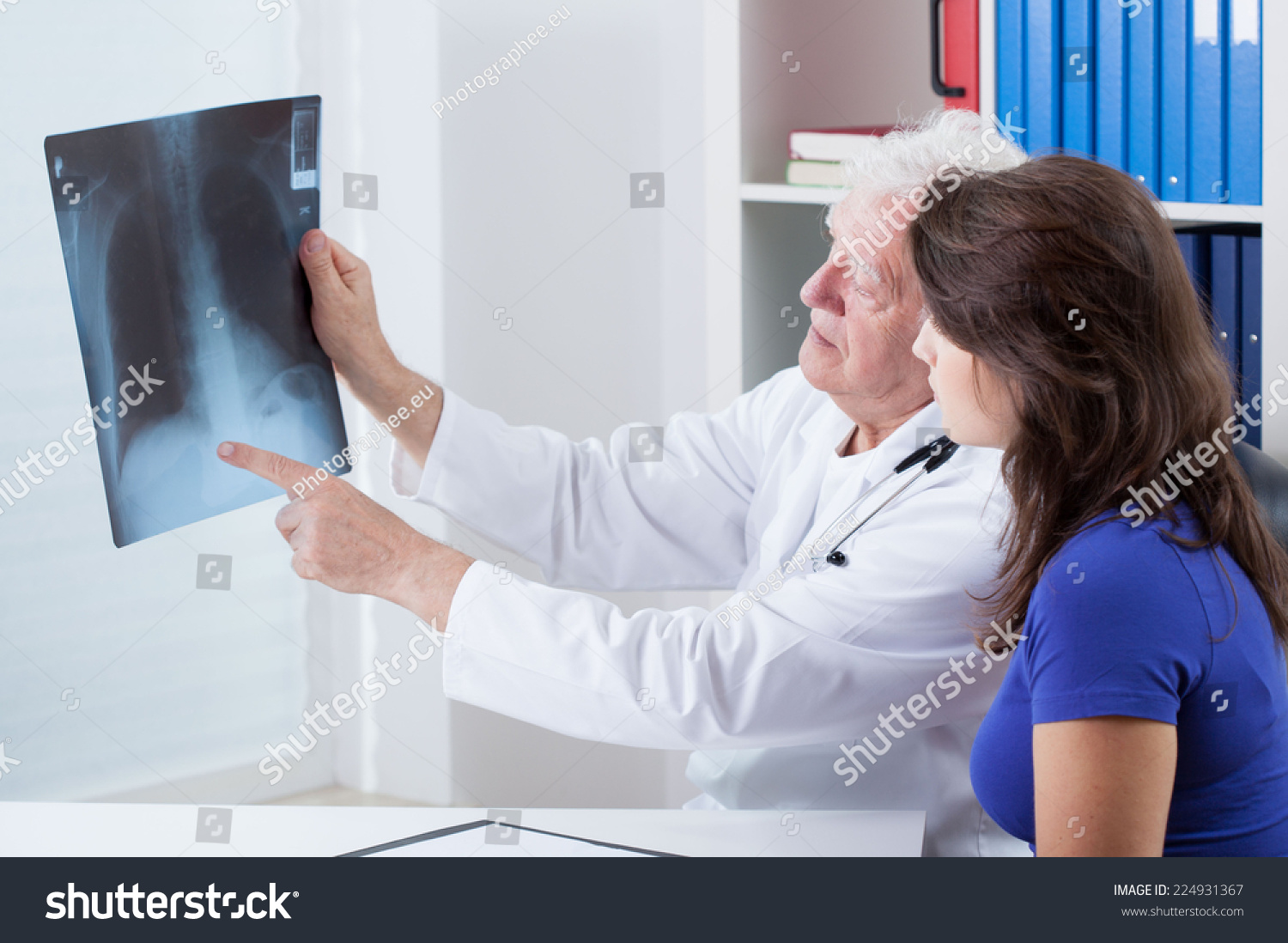 Experienced doctor analyzing x-ray of the lungs #224931367