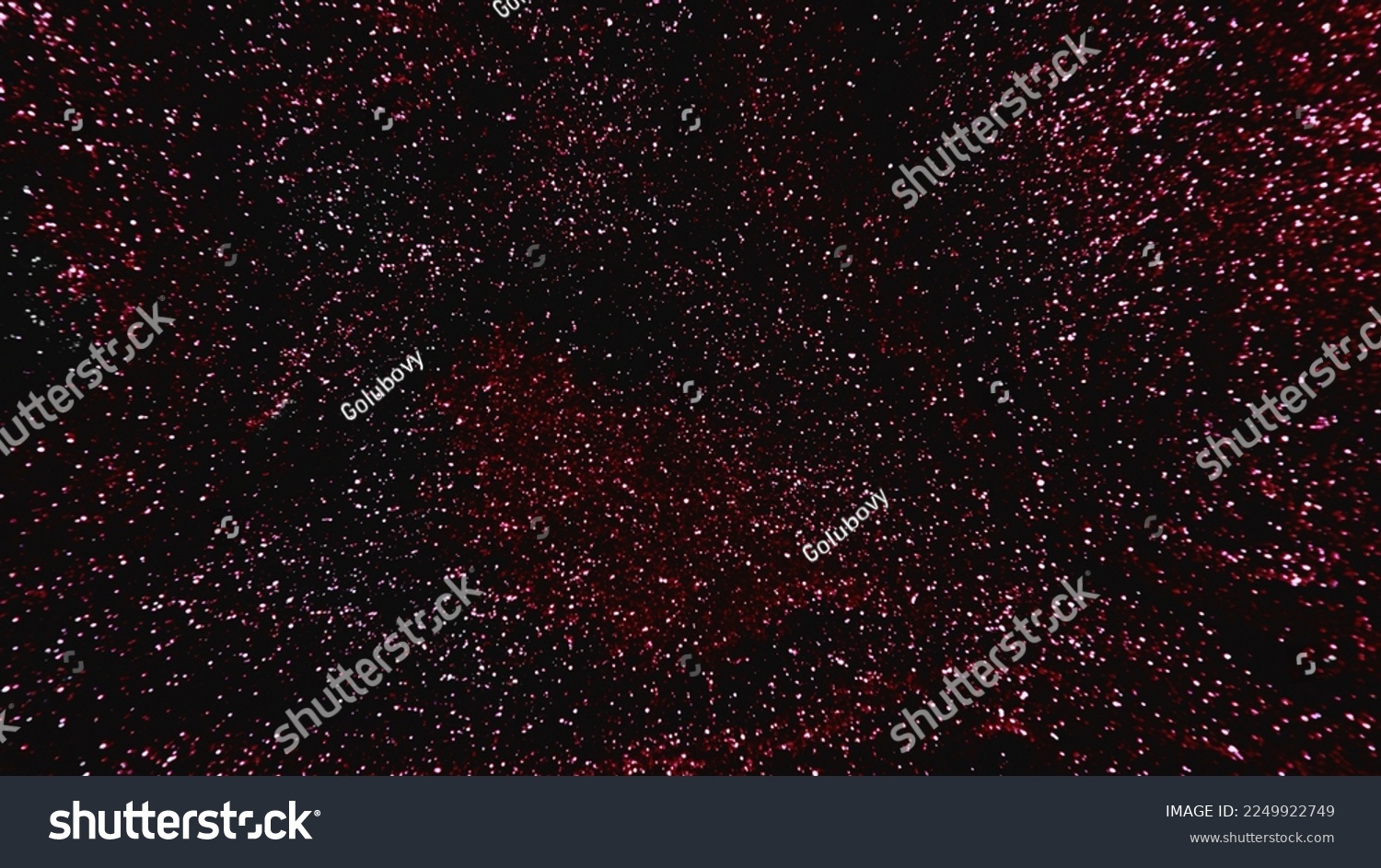 Sparkling background. Grain texture. Bokeh glow. Defocused shimmering red pink black color glitter sparks on dark abstract free space. #2249922749