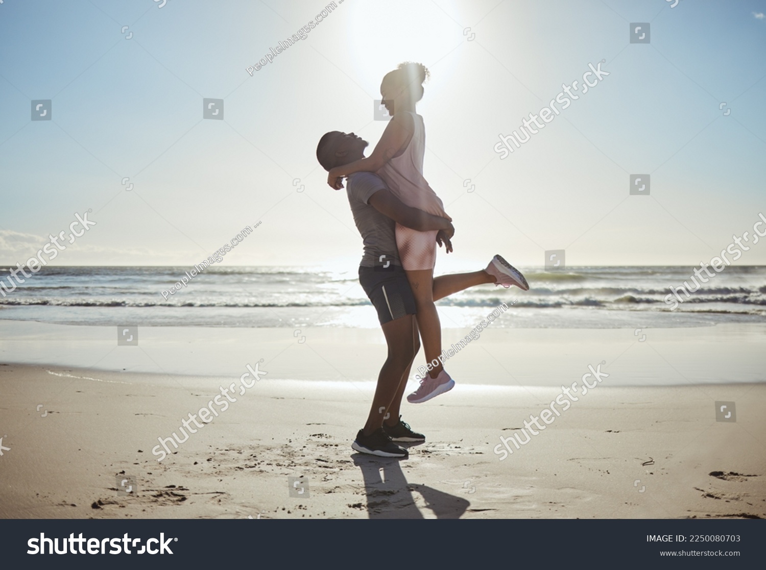 Love, beach sunset and black couple on travel holiday honeymoon for anniversary in Cancun Mexico spring break, summer fun and fitness run. Man, woman and happy relationship romance enjoy morning sun #2250080703