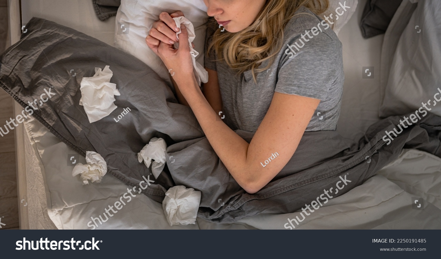 Sick day at home. Woman has runny and common cold. Cough. Closeup Of Beautiful Young Woman Caught Cold Or Flu Illness. Portrait Of Unhealthy Girl In Feeling Pain In Throat. #2250191485