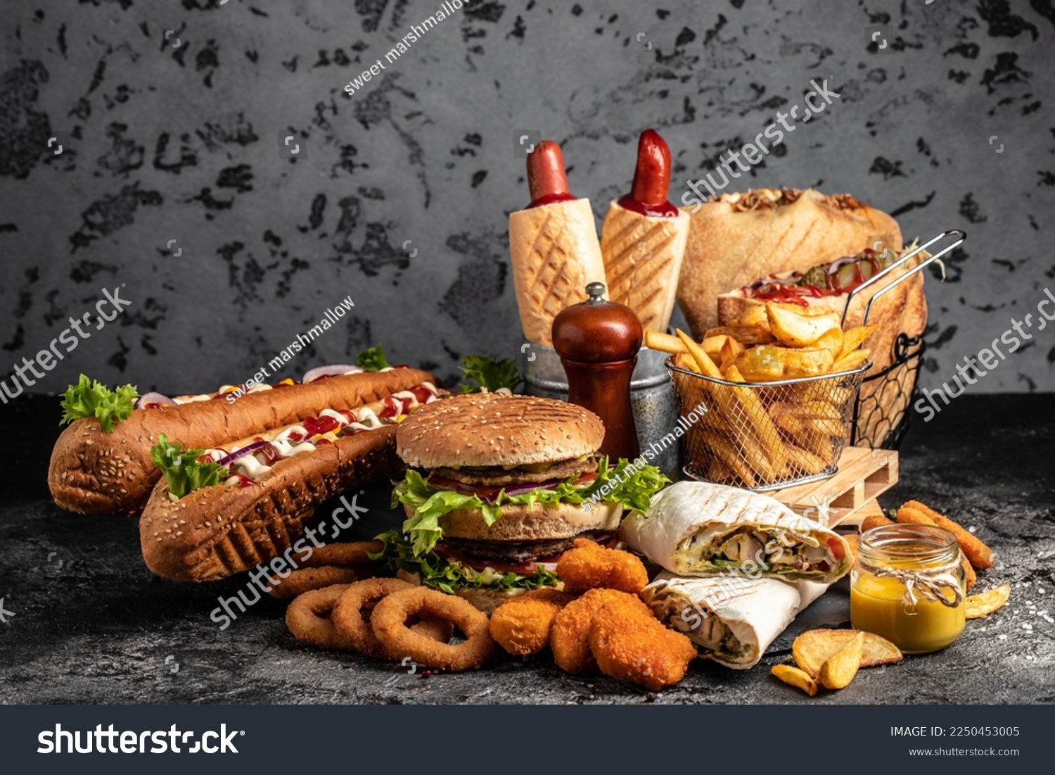 take away fast food products Kebab, pita, gyros, shaurma, wrap sandwich with french fries and nuggets meal, junk food and unhealthy food. banner, menu, recipe place for text. #2250453005
