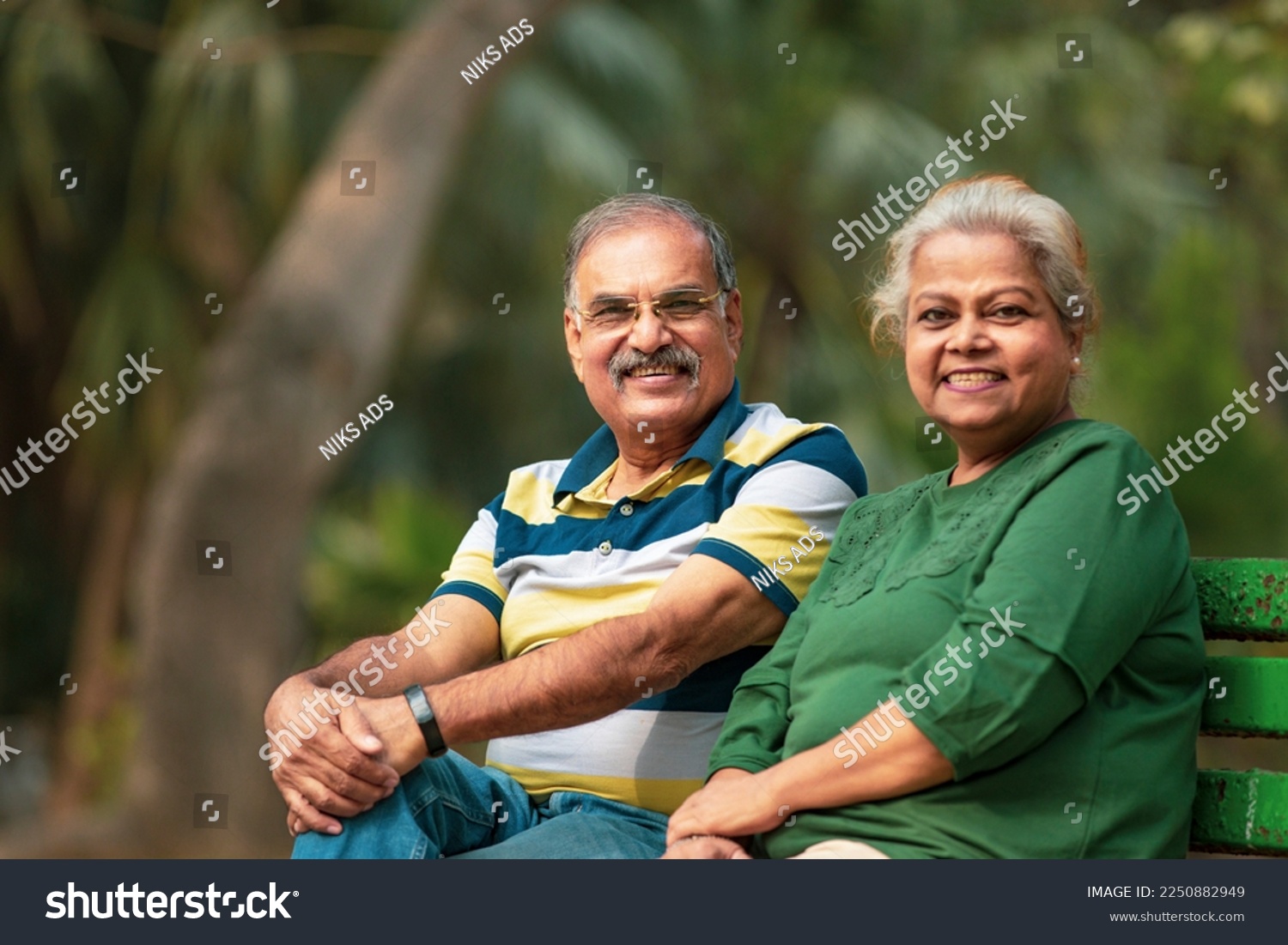 happy Old couple spending time together at park. #2250882949