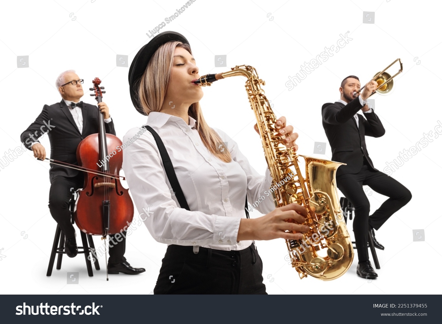 Woman playing a sax and two men in the back playing a trombone and a cello isolated on white background #2251379455