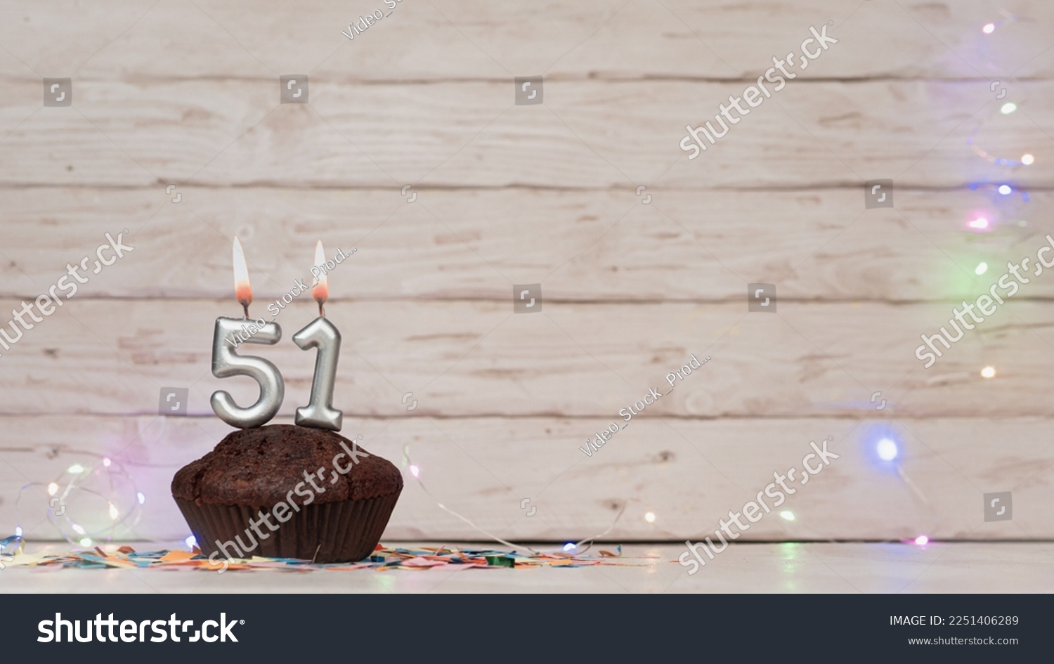 Festive card Happy Birthday with number of burning candles. Beautiful background copy space, happy birthday with digit number 51 #2251406289