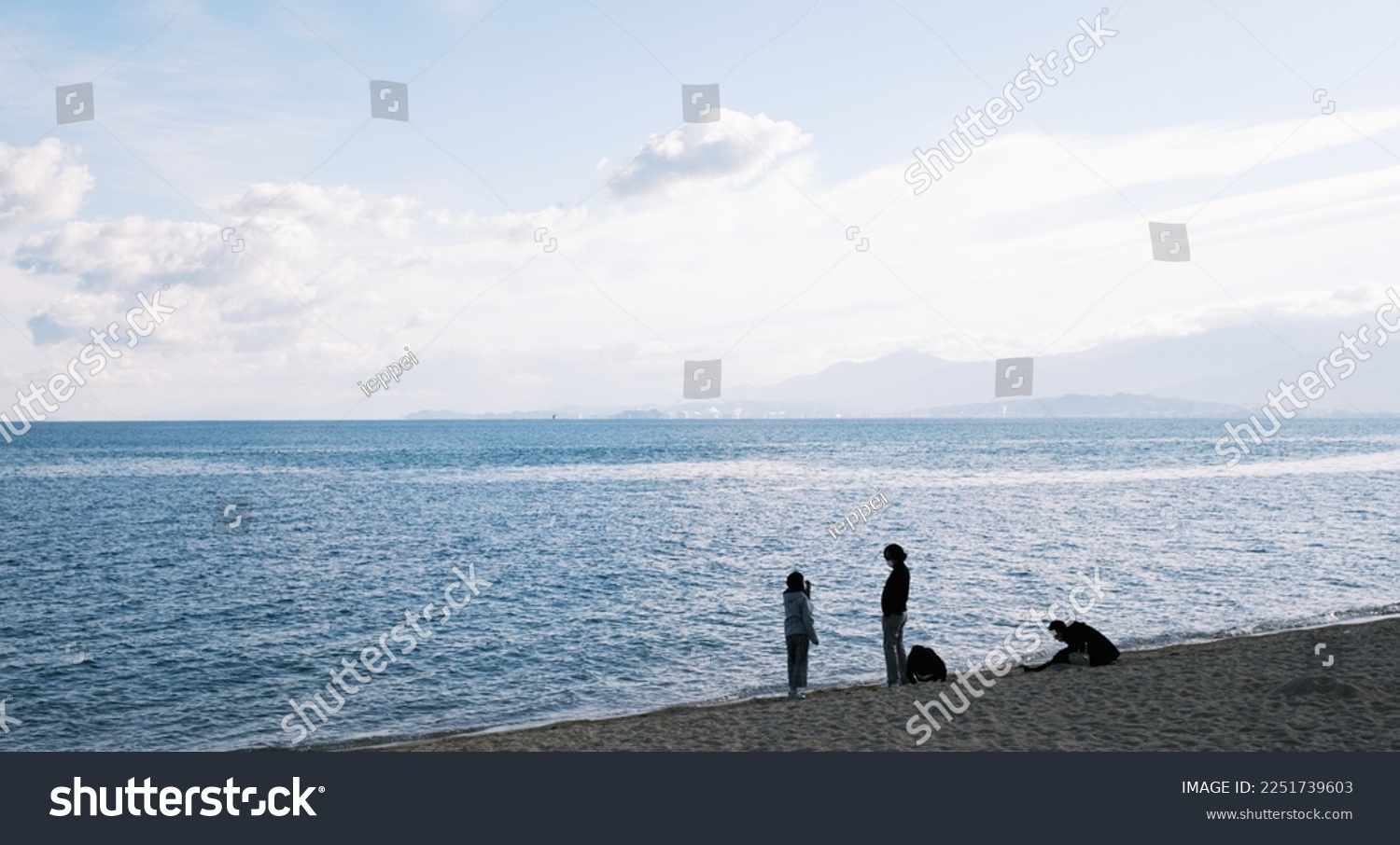 Silhouette of a family playing on a beach in the Seto Inland Sea #2251739603