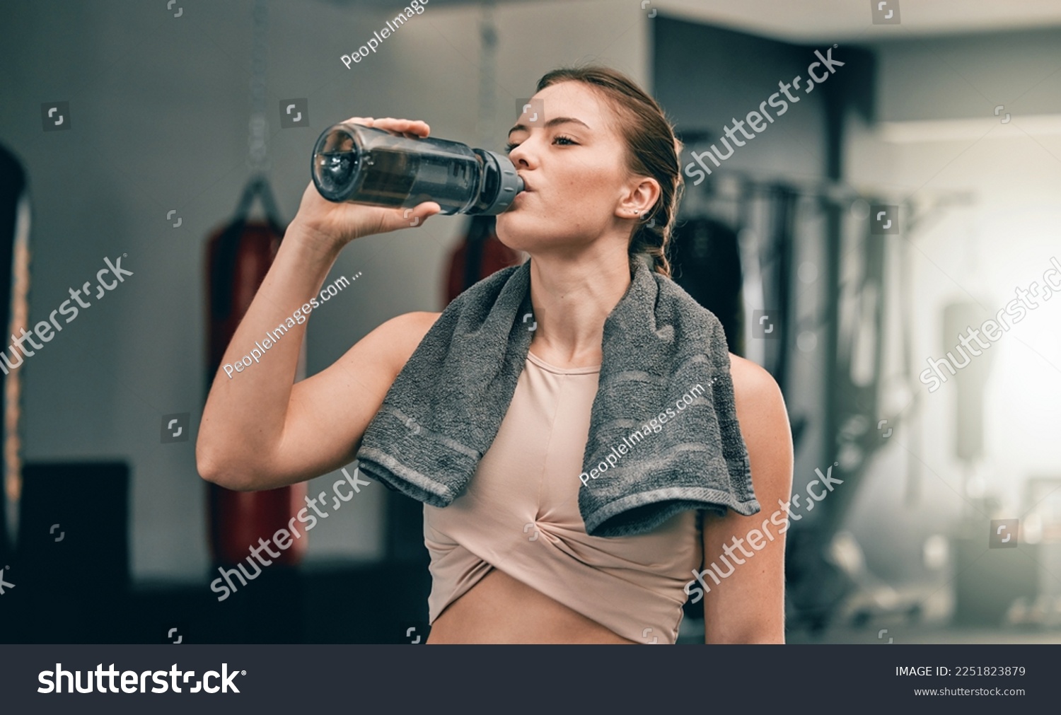 Exercise health, gym and woman drinking water for sports thirst hydration, fitness performance or running workout. Athlete wellness, fatigue and tired girl with liquid bottle drink after training #2251823879
