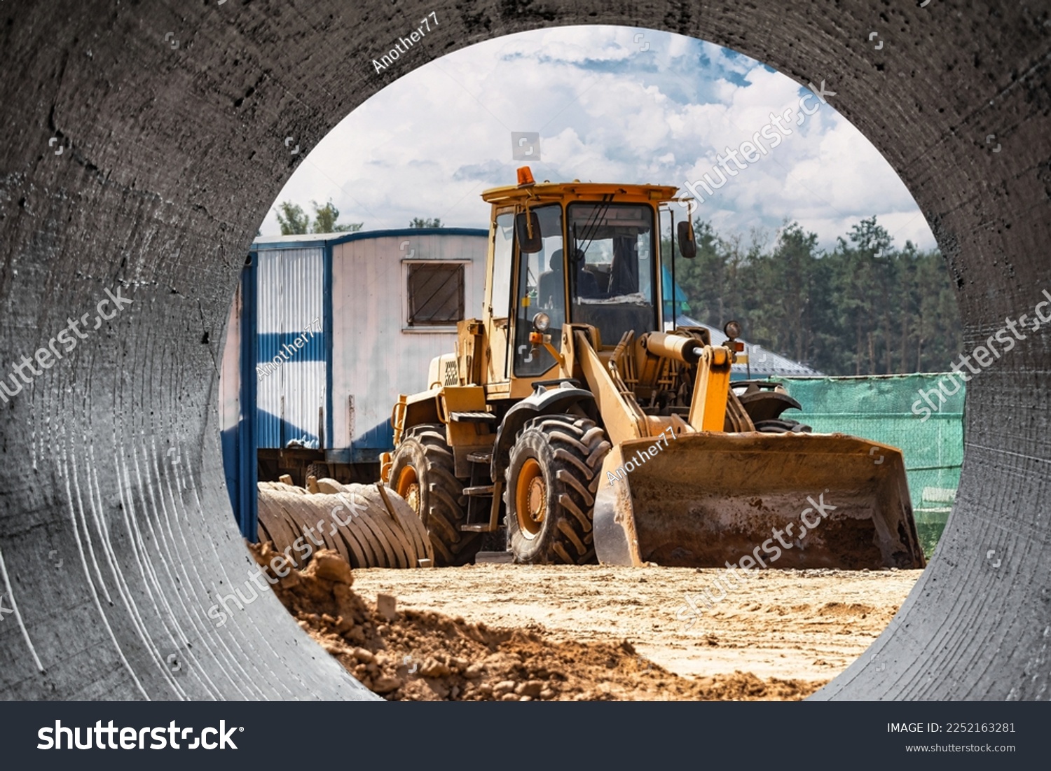 Powerful crawler bulldozer close-up at the construction site. Construction equipment for moving large volumes of soil. Modern construction machine. Road building machine #2252163281