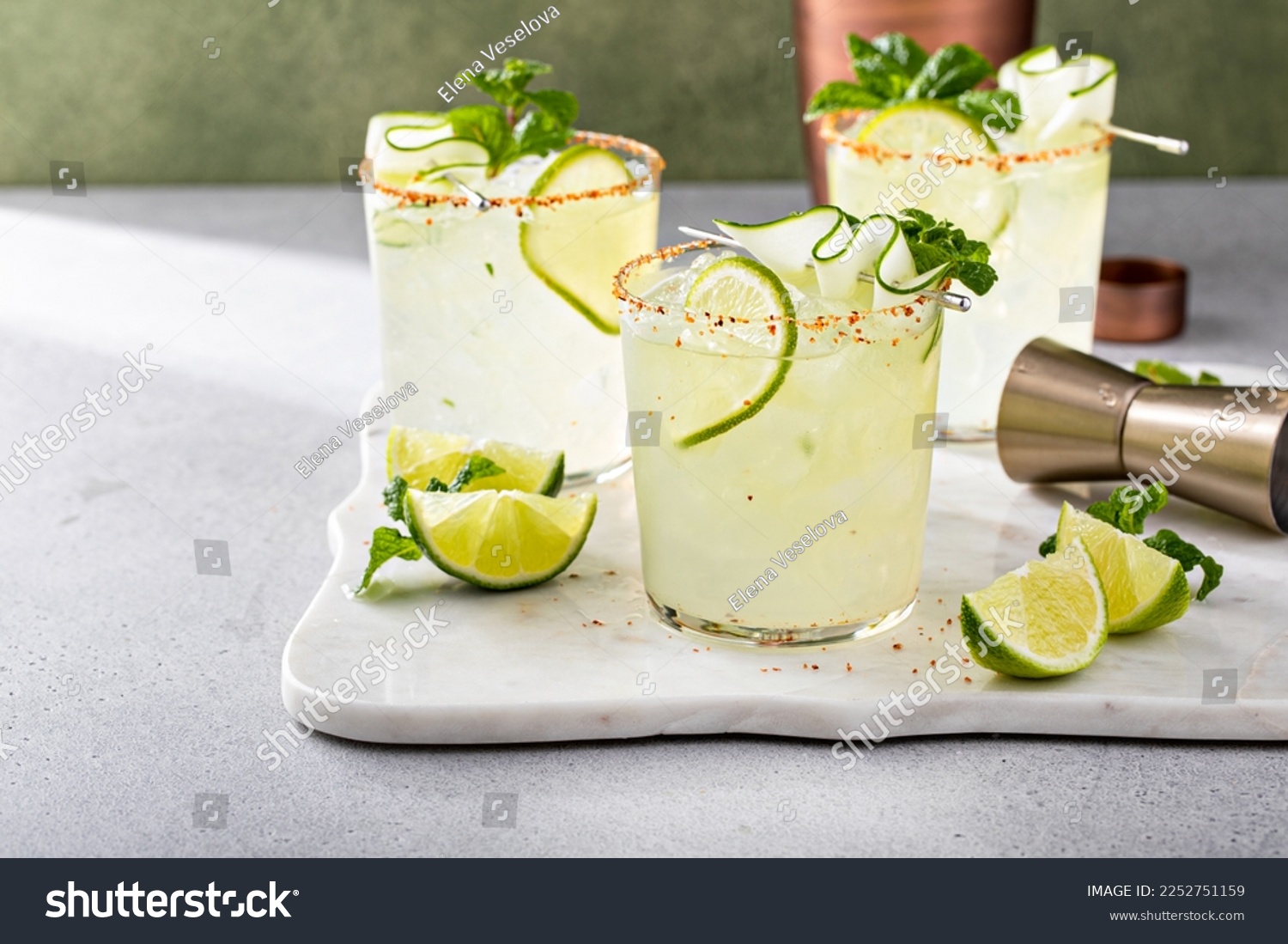 Cucumber margarita with lime and spicy rim, refreshing spring cocktail with copy space #2252751159