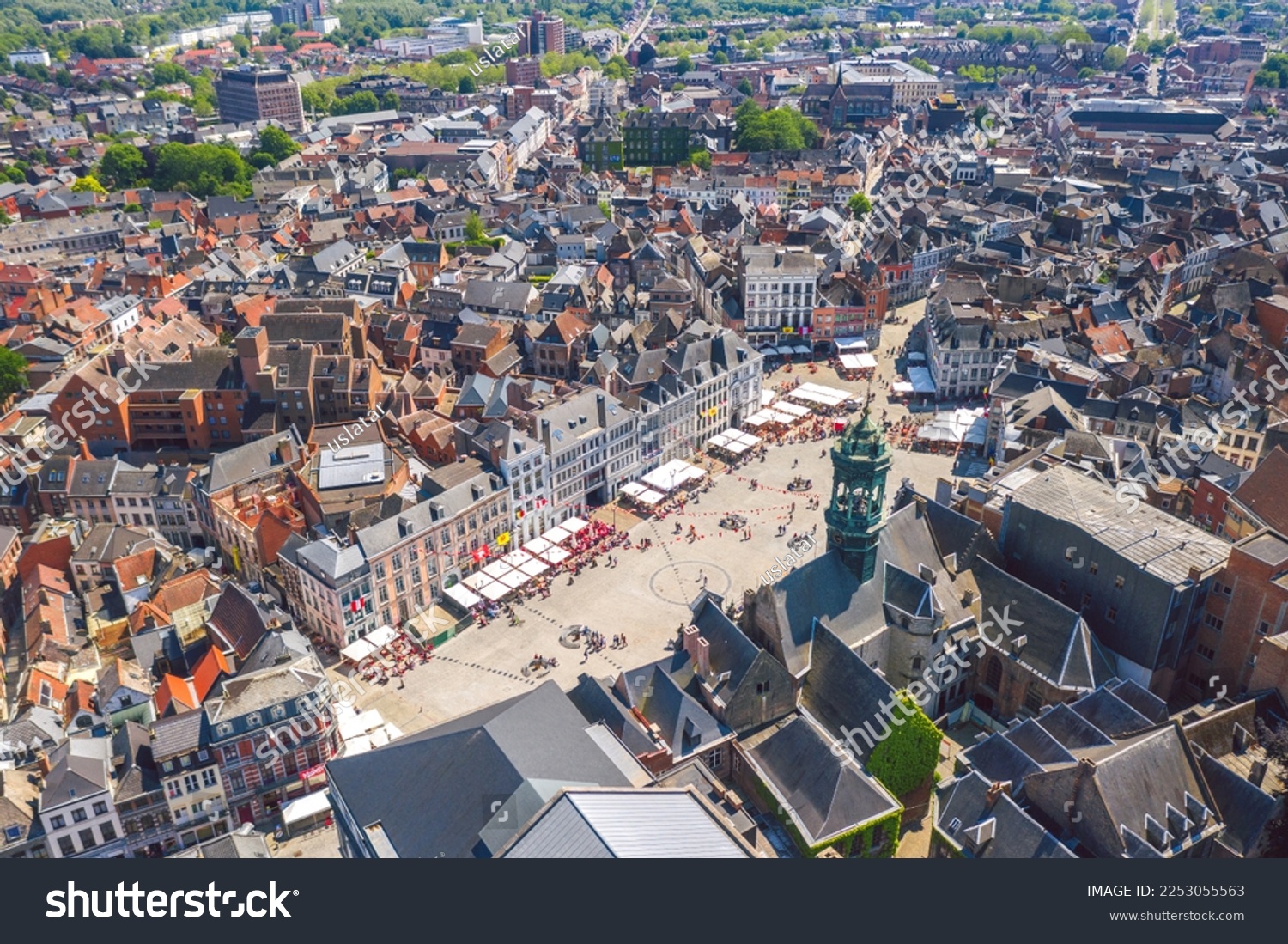 Aerial skyline summer view of vibrant central square (Grand-Place de Mons) and town hall of Mons (Bergen). Wallonia, capital of Hainaut, Belgium.  #2253055563