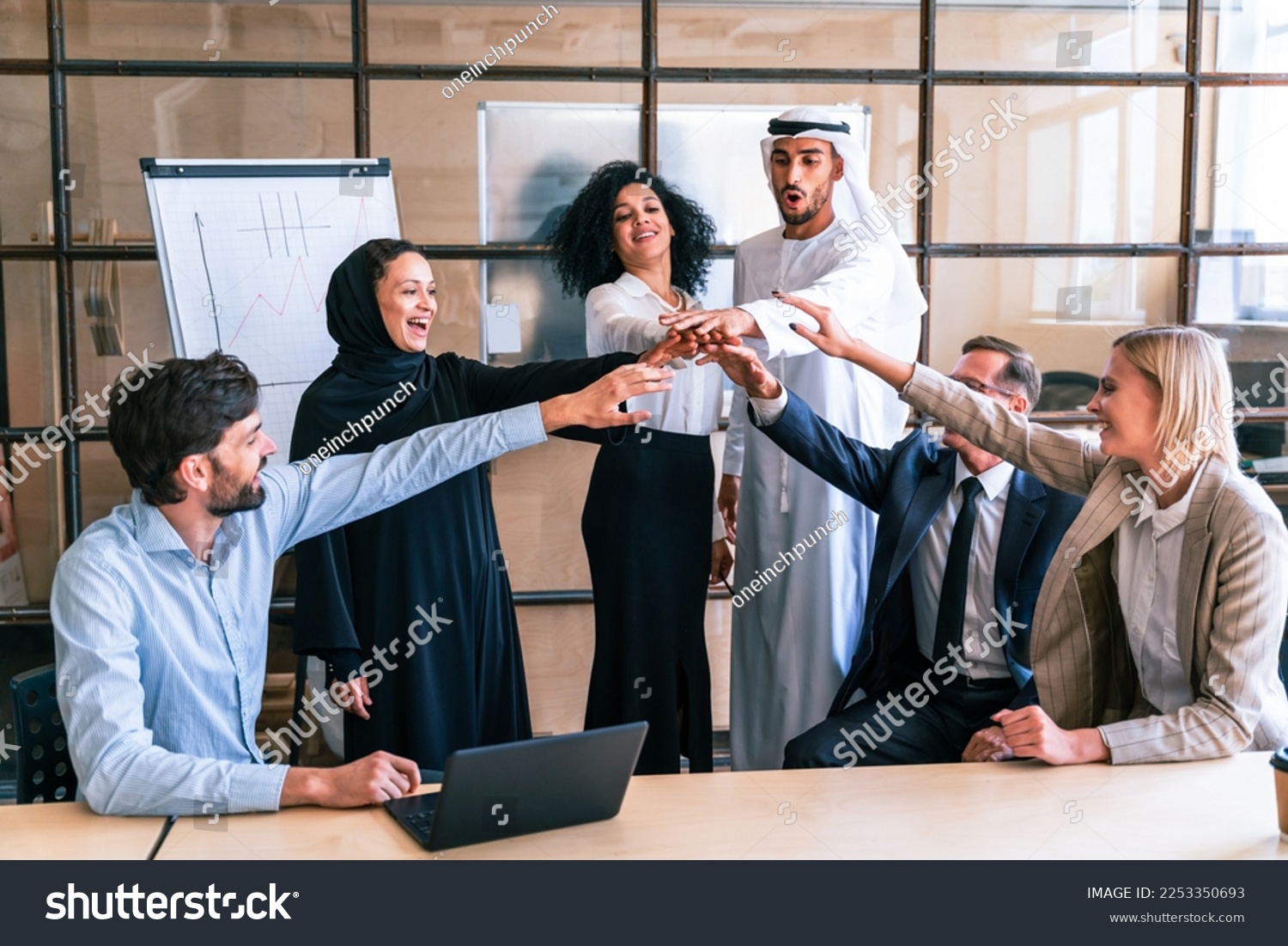 Multiethnic corporate business team meeting in the office for a strategic marketing plan - Office workers, entrepreneurs and company employee at work in a multinational company #2253350693