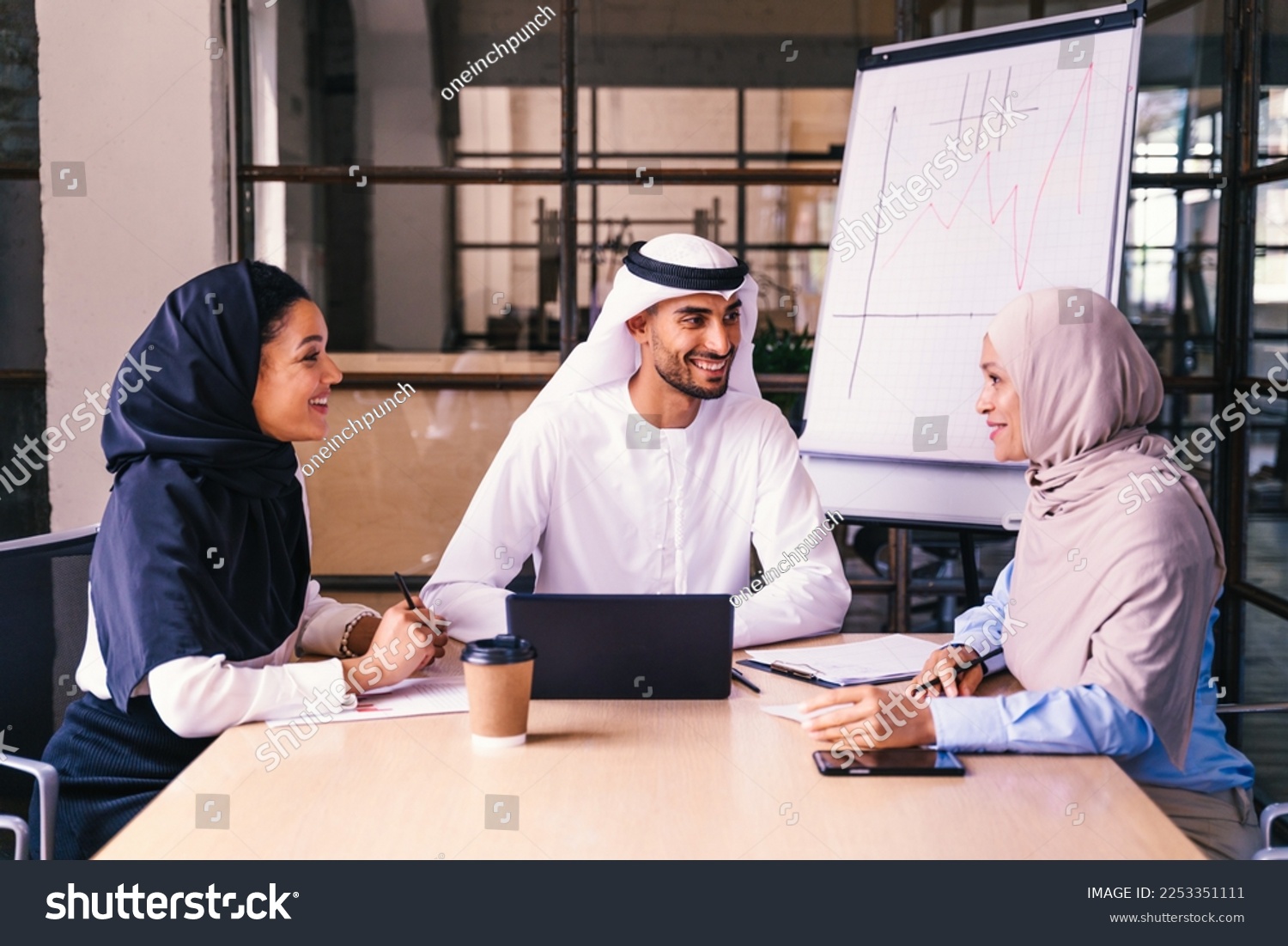 Multiethnic corporate business team meeting in the office for a strategic marketing plan - Office workers, entrepreneurs and company employee at work in a multinational company #2253351111