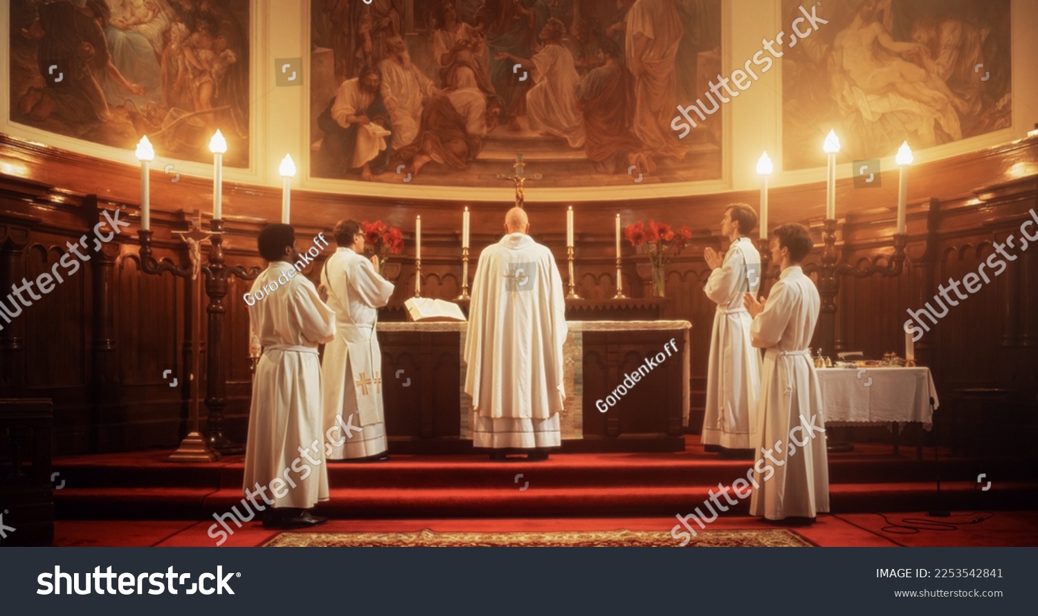 In Grand Old Church at the Altar Ministers Lead The Eucharist, a Sacred Christian Ceremony. Holy Communion, Divine Mass, Lord's Supper. Community Sharing Wisdom and Guidance of the Bible #2253542841