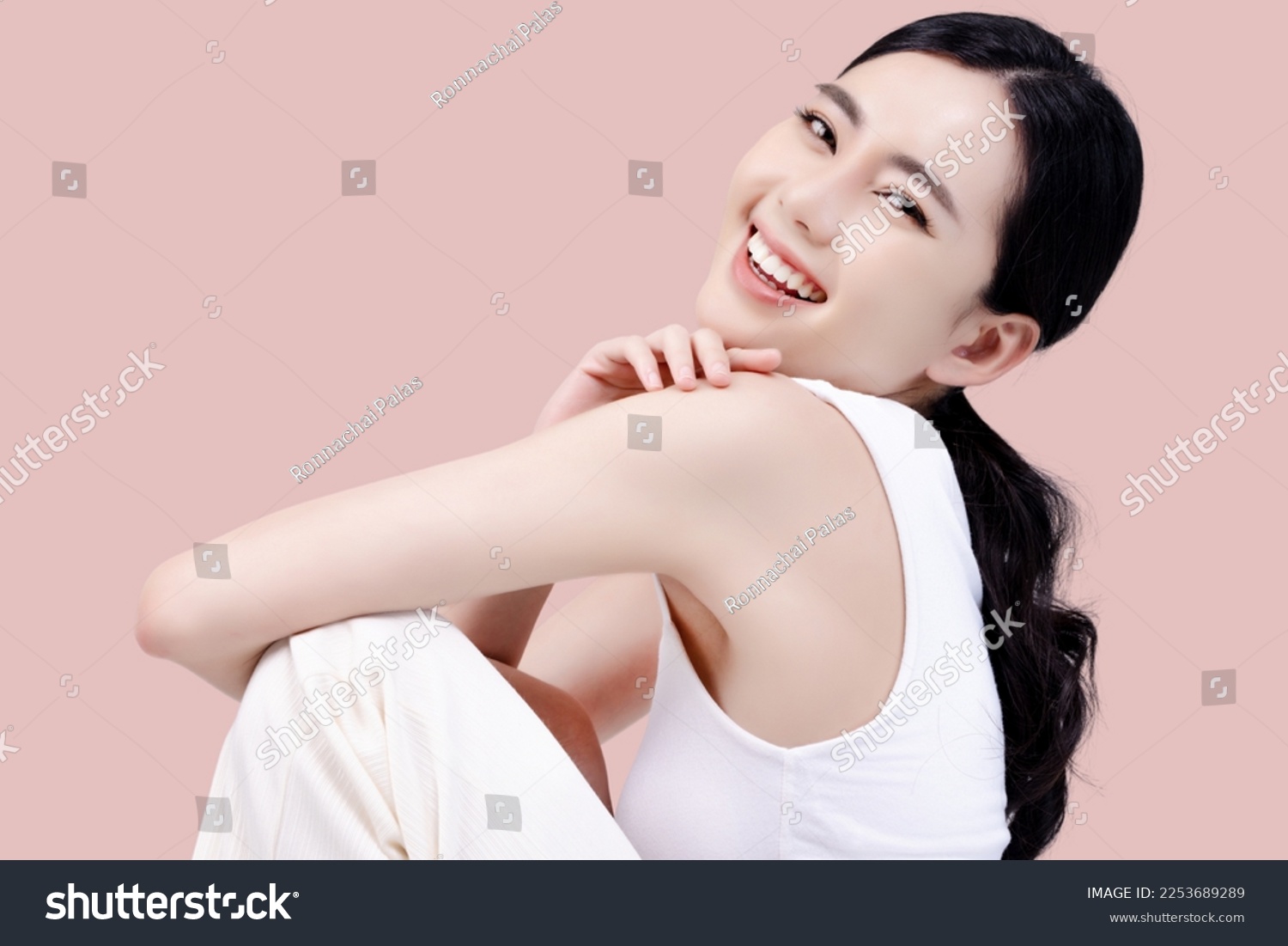 Studio shot of Beautiful young Asian woman with clean fresh skin on pink background, Face care, Facial treatment, Cosmetology, beauty and spa. #2253689289