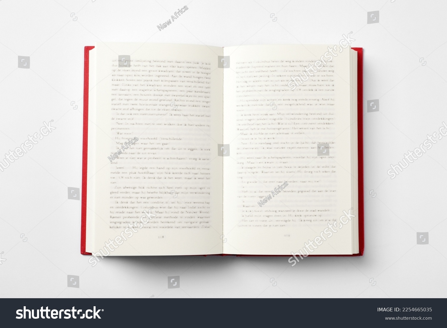 Open book on white background, top view #2254665035