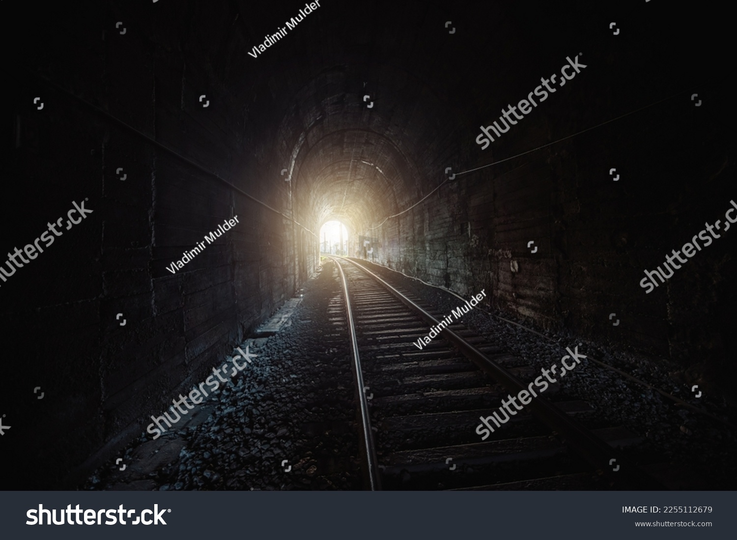 Light at the end of railroad tunnel. #2255112679