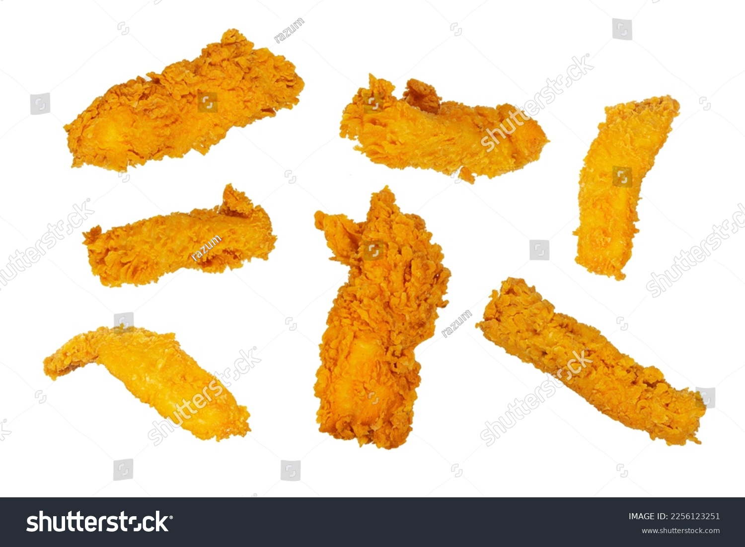 Golden fried chicken strips in different angles isolated on a white background.  #2256123251