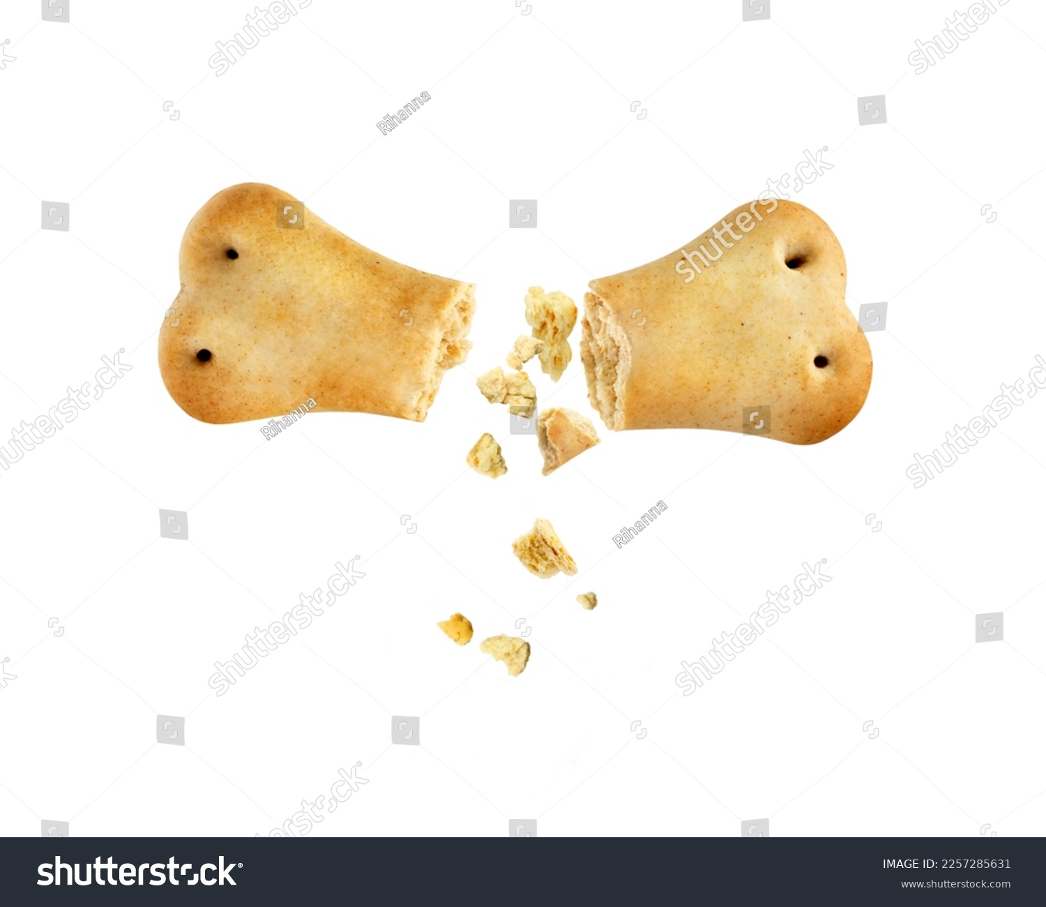 Broken dog biscuit isolated on white background #2257285631